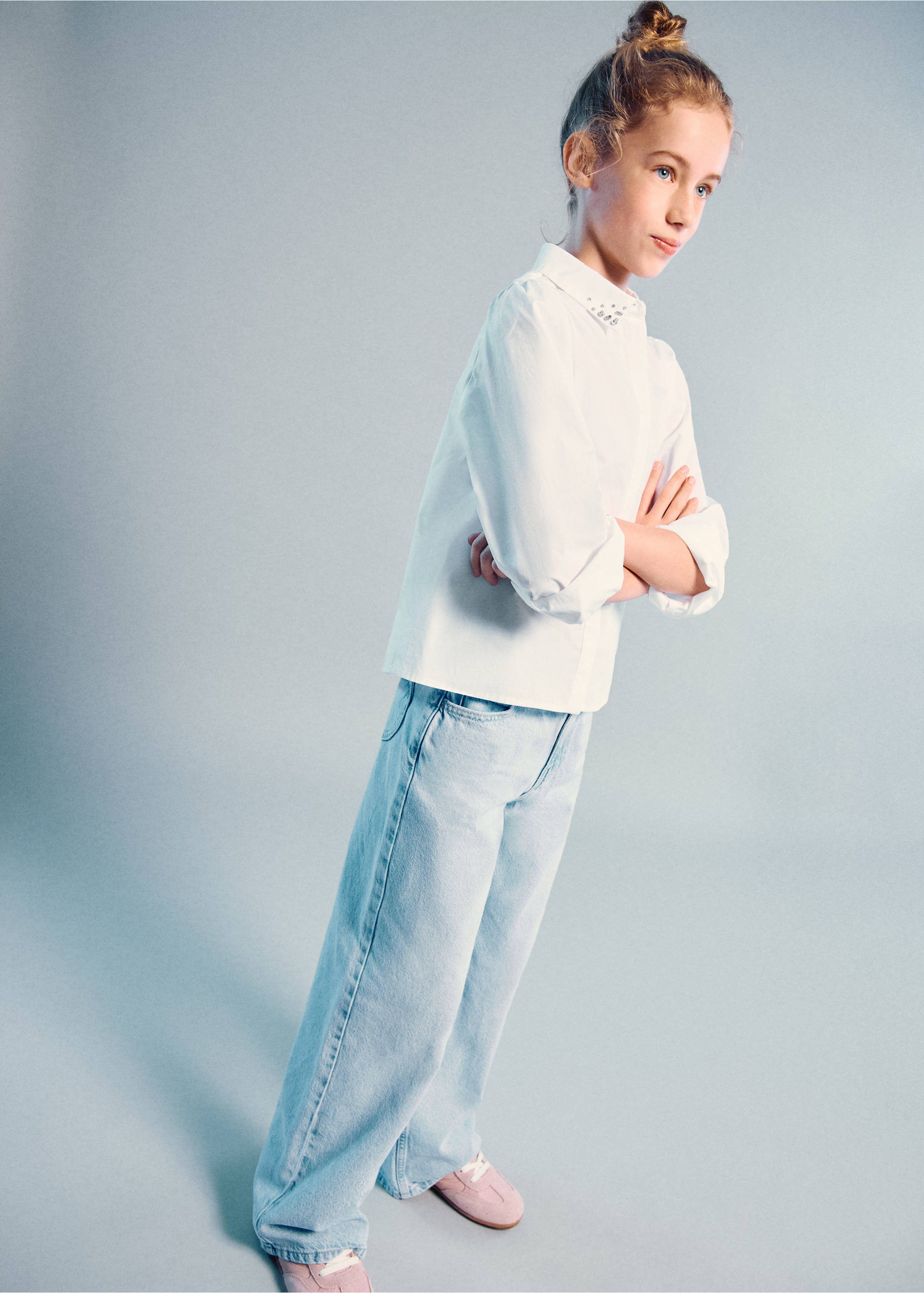 Light blue denim trousers worn with a white shirt and pink trainers., Light Blue. Ref: 27001266-00.