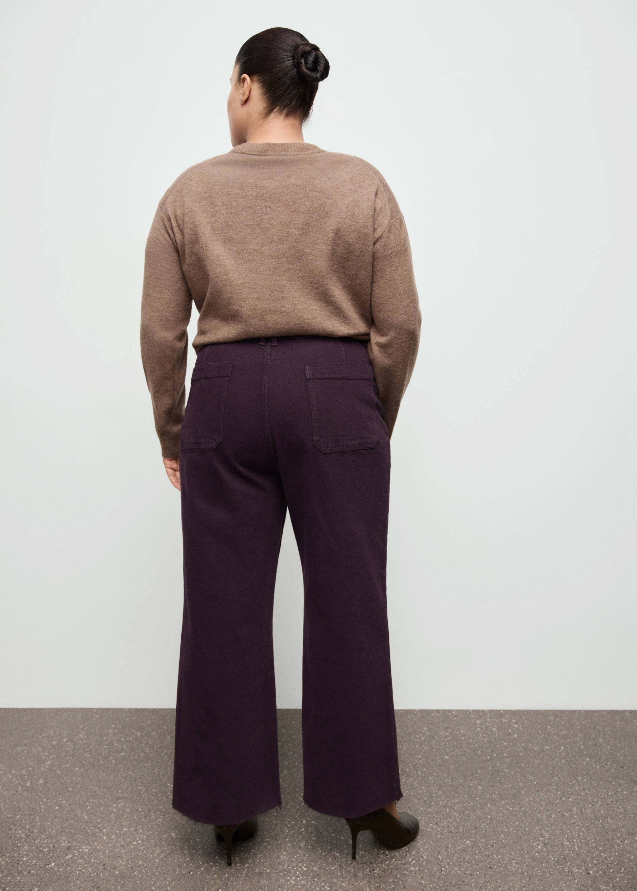 Dark purple denim trousers in a straight-leg fit, back view.