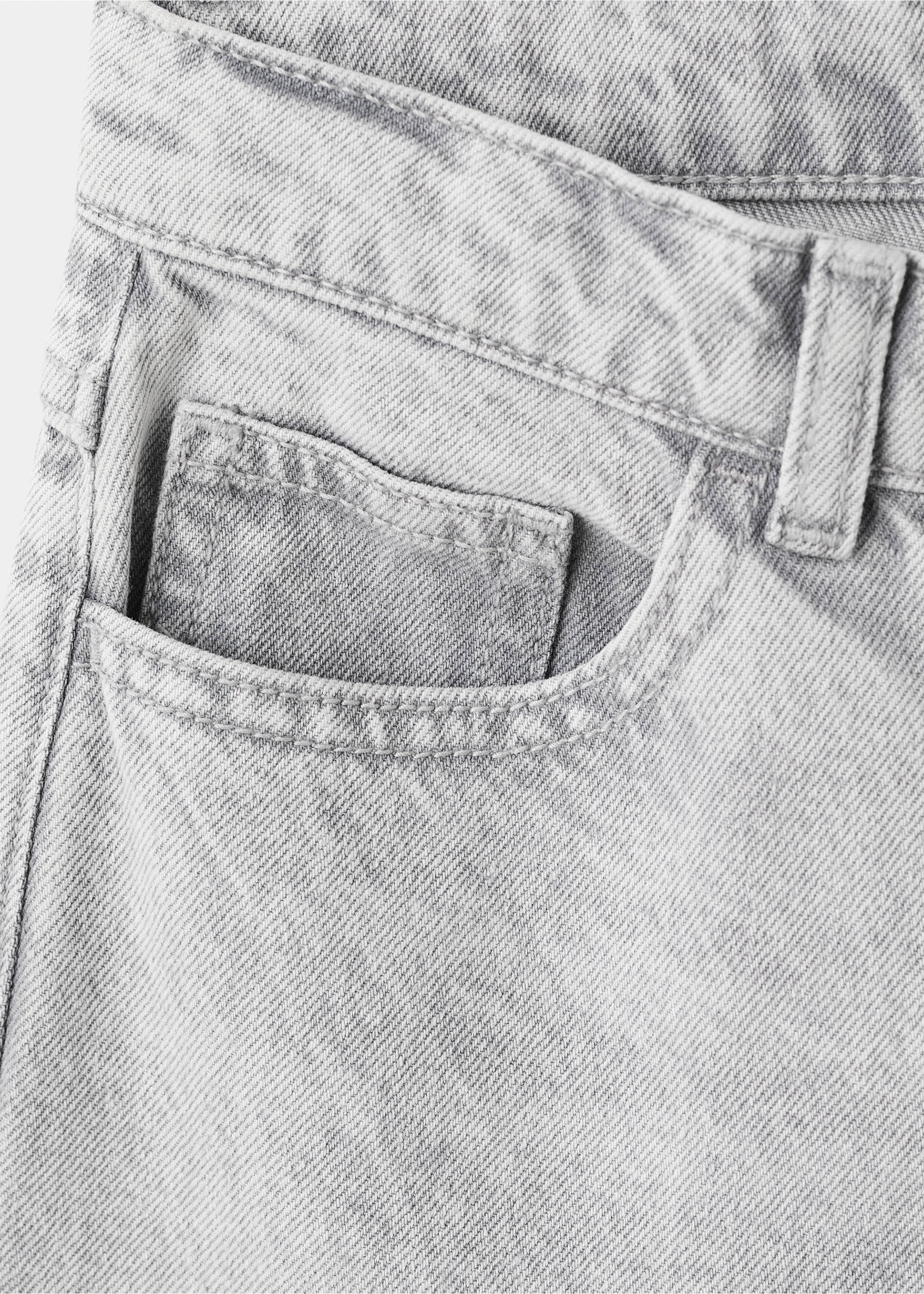 Close-up of light grey denim trousers featuring coin pocket detail., Denim Grey. Ref: 27011260-00.