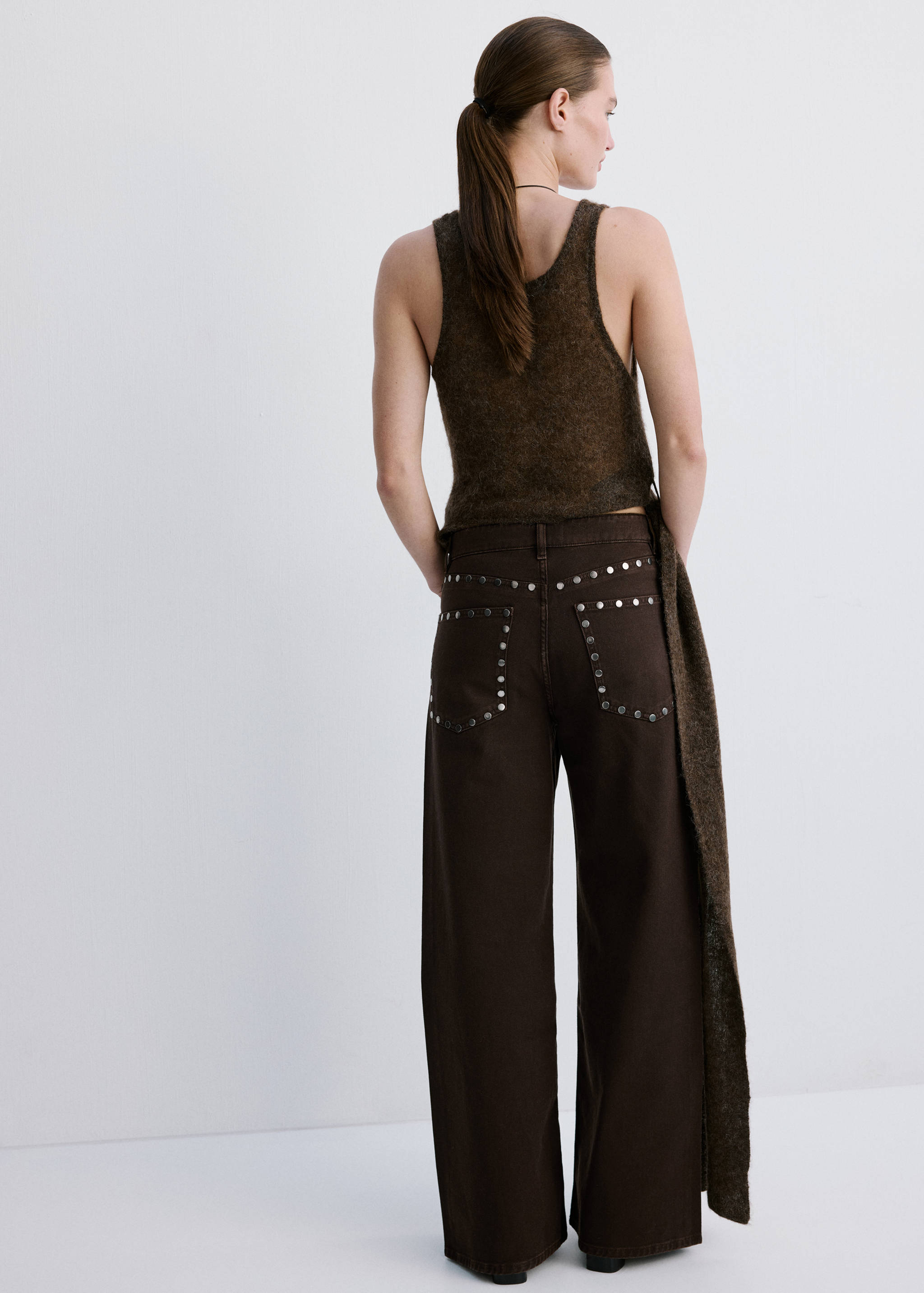 Jeans wide leg amb tatxes - Revers de l'article