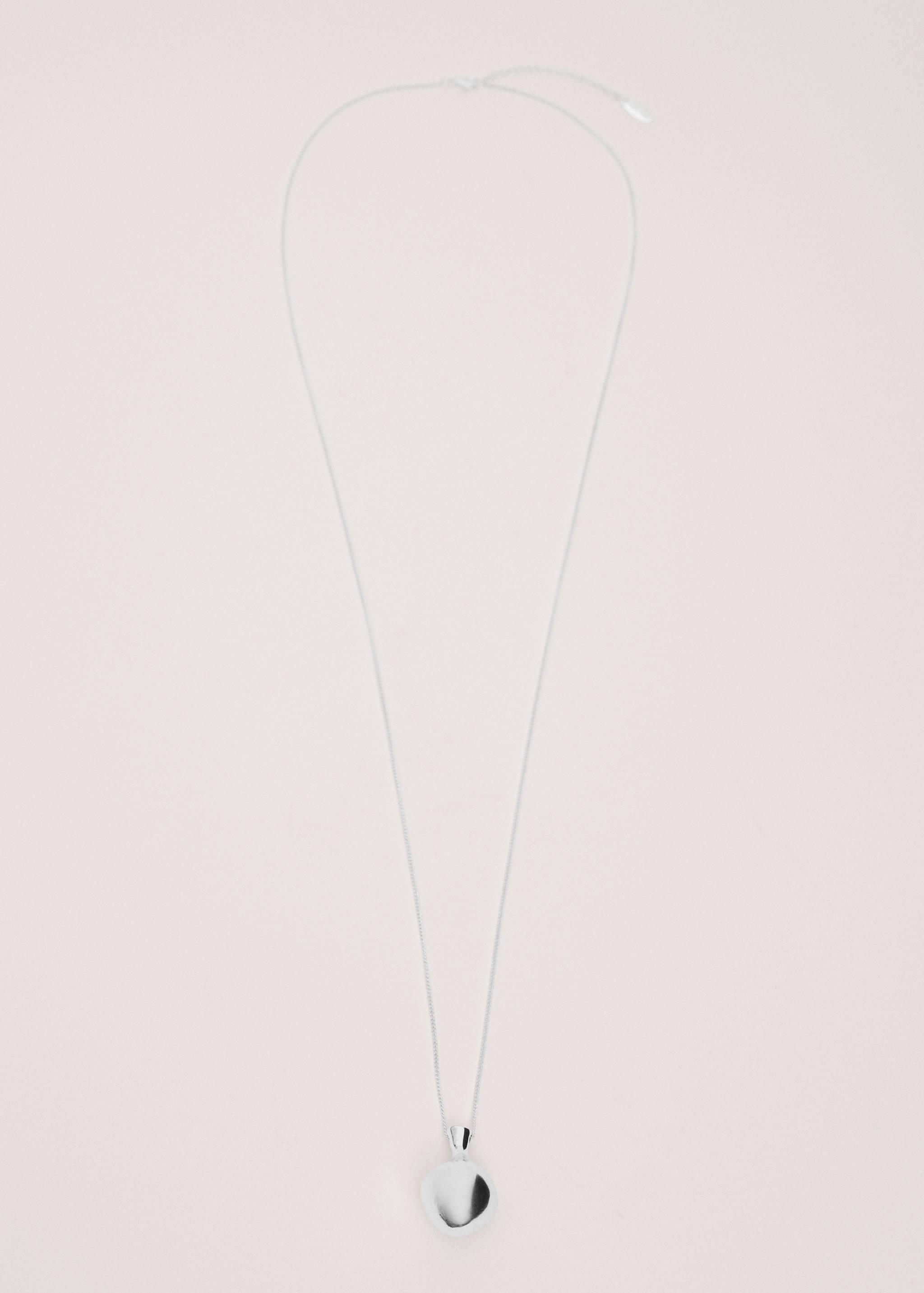 Silver-coloured chain necklace with a rounded pendant.
