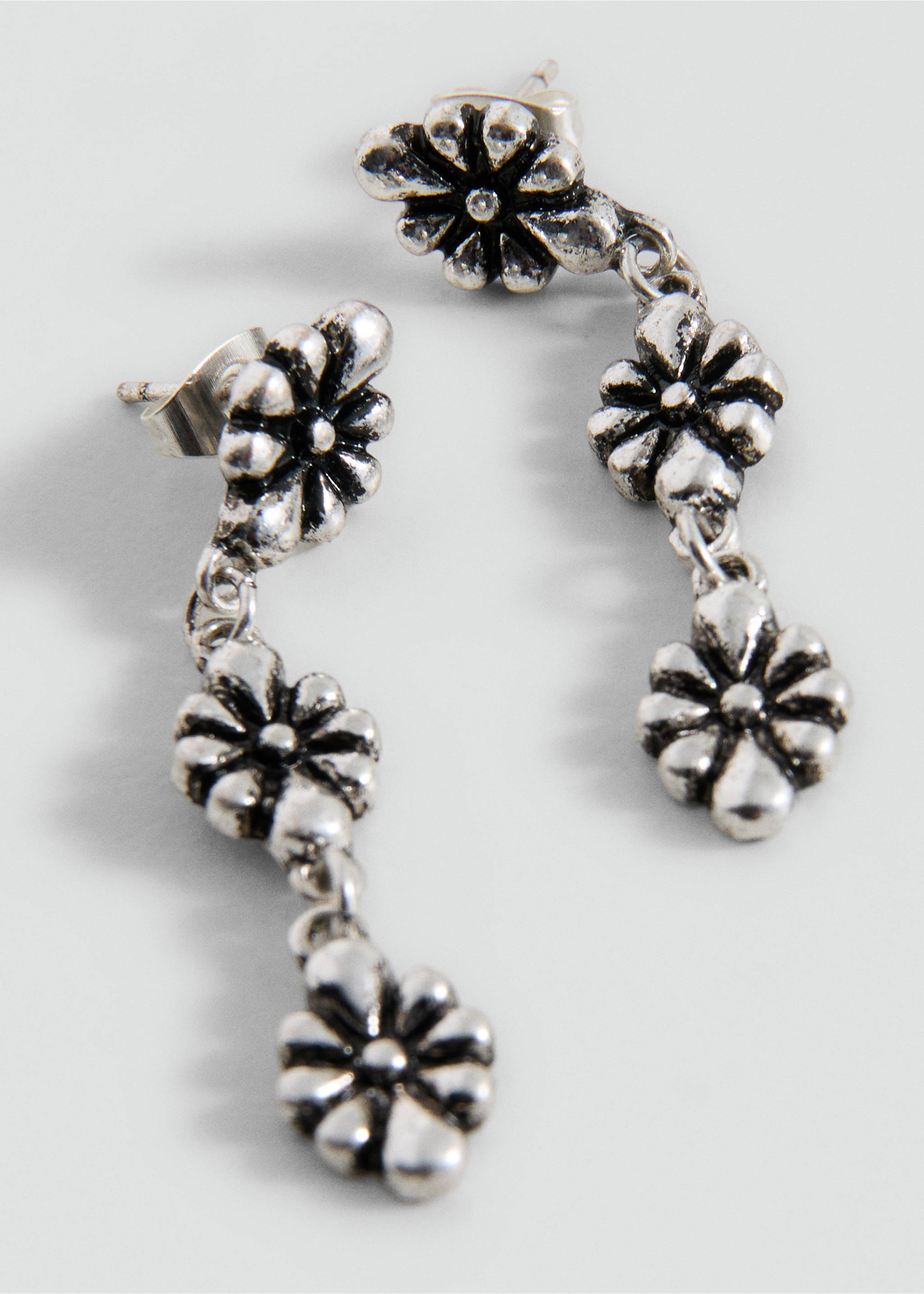 Silver-toned drop earrings featuring three linked flower charms with an antiqued finish., Silver. Ref: 27017927-00.