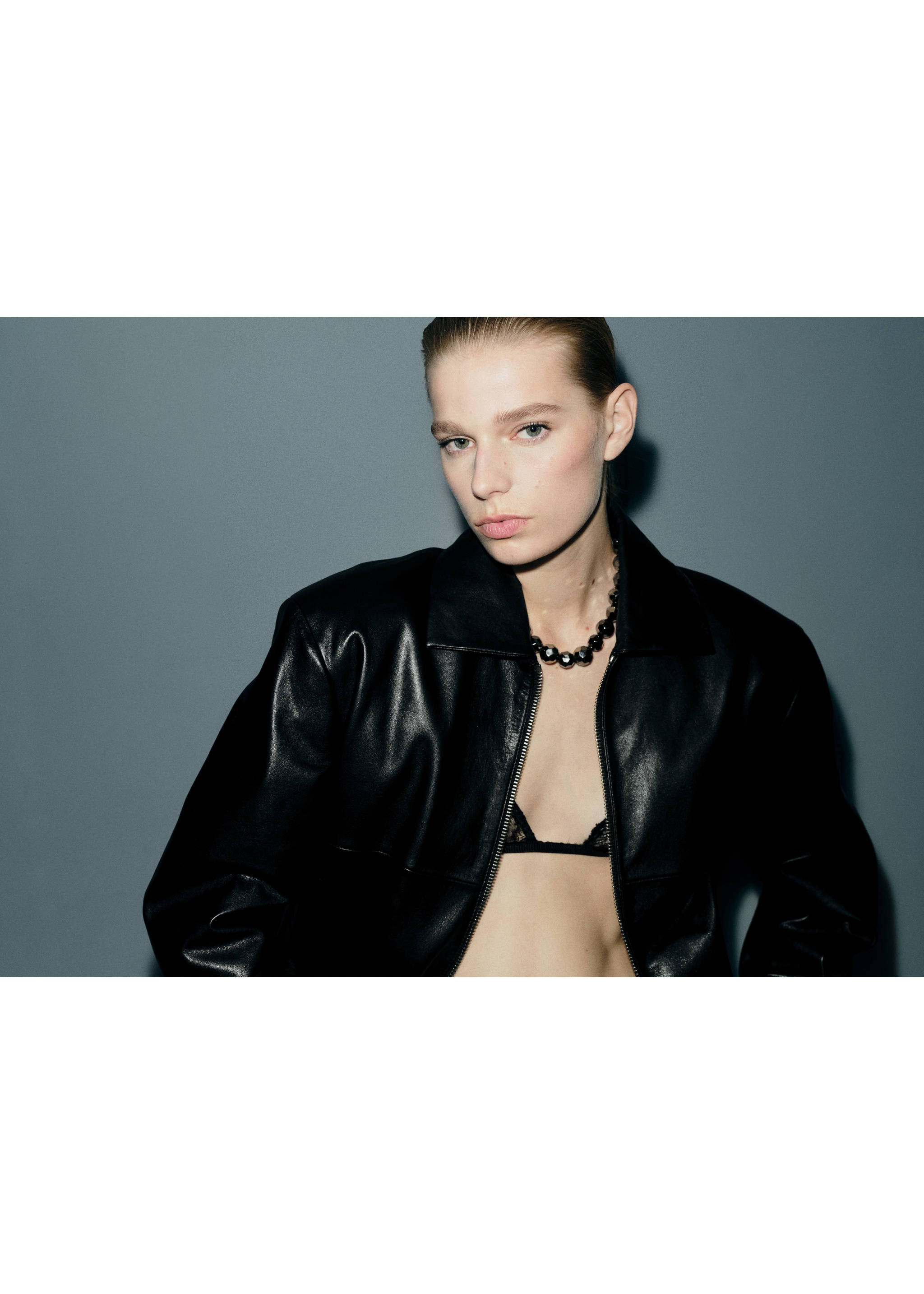 Black beaded necklace worn with a black leather jacket., Silver. Ref: 27021228-00.