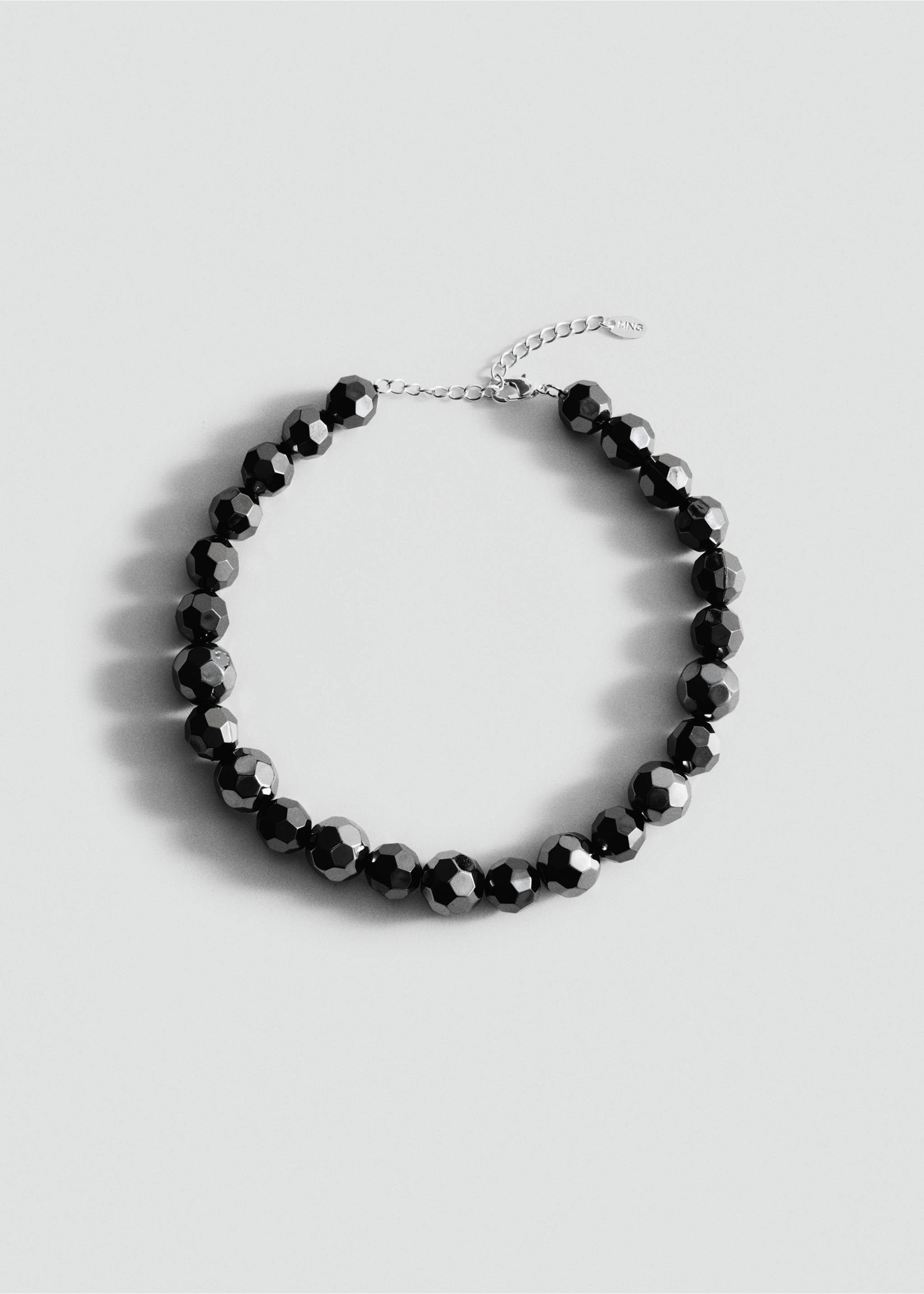 Black faceted bead collar necklace with an adjustable silver chain., Silver. Ref: 27021228-00.