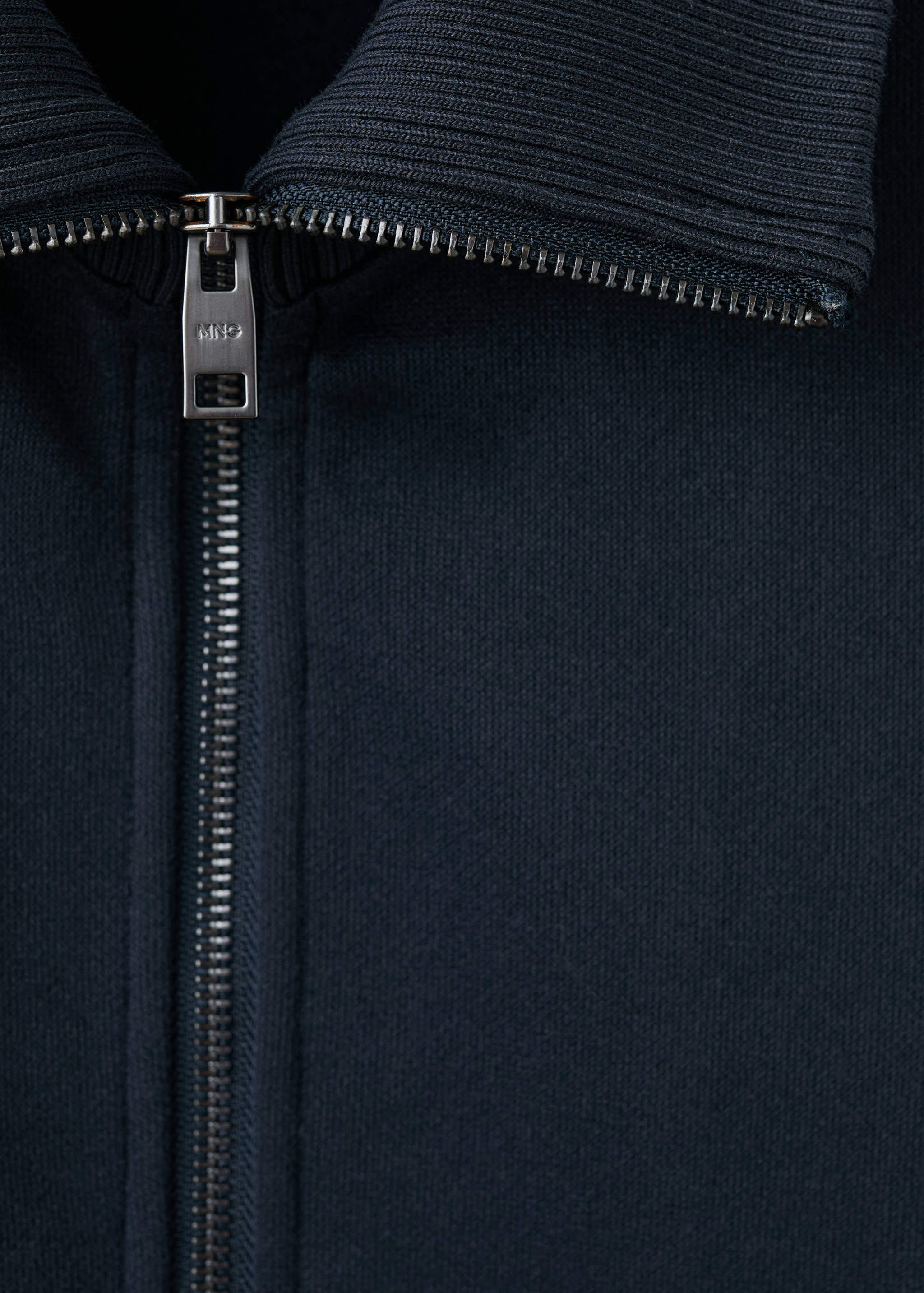 Navy sweatshirt fabric and zip detail