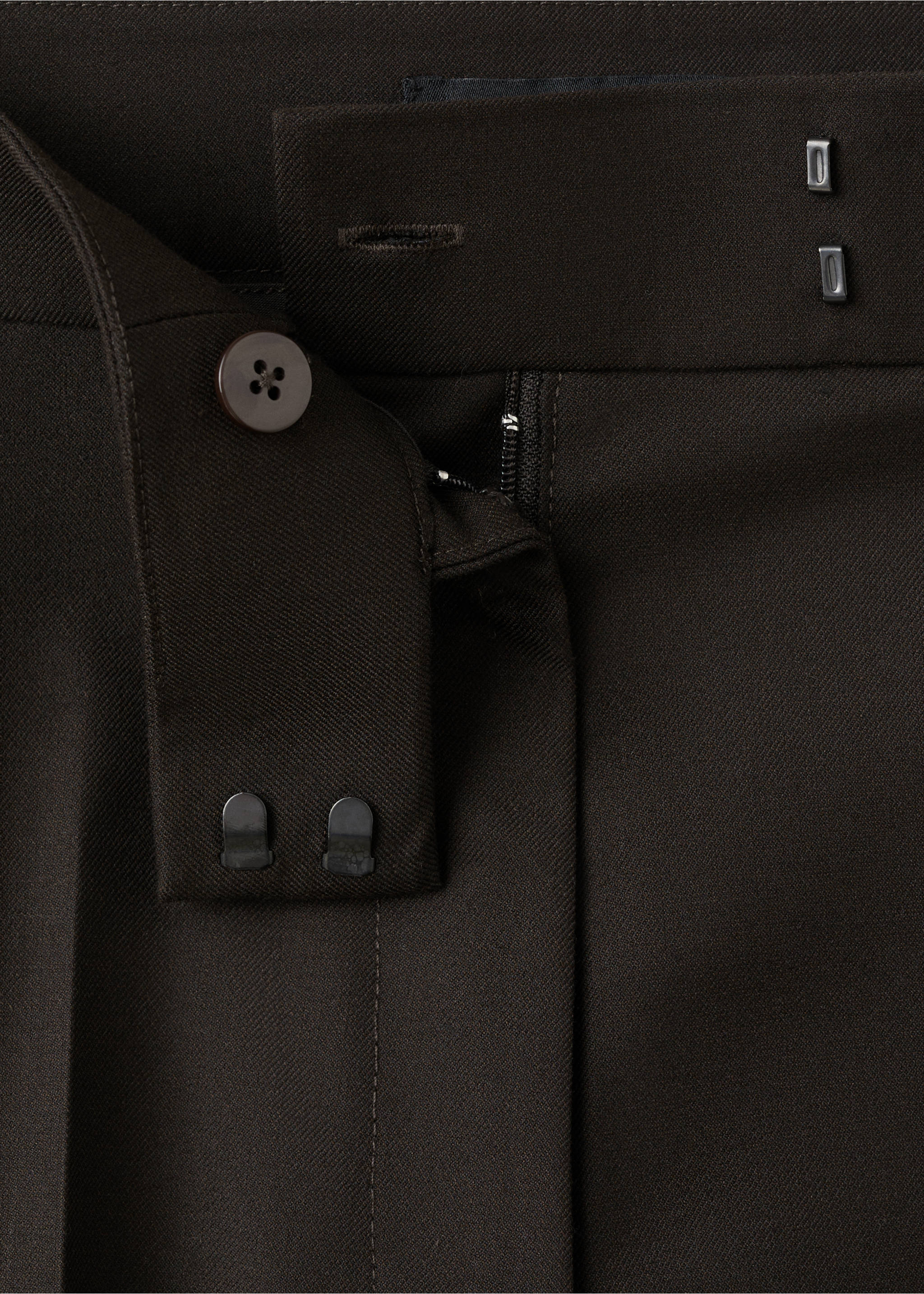Dark brown trousers waist detail with button and tab closure., Chocolate. Ref: 27021296-00.