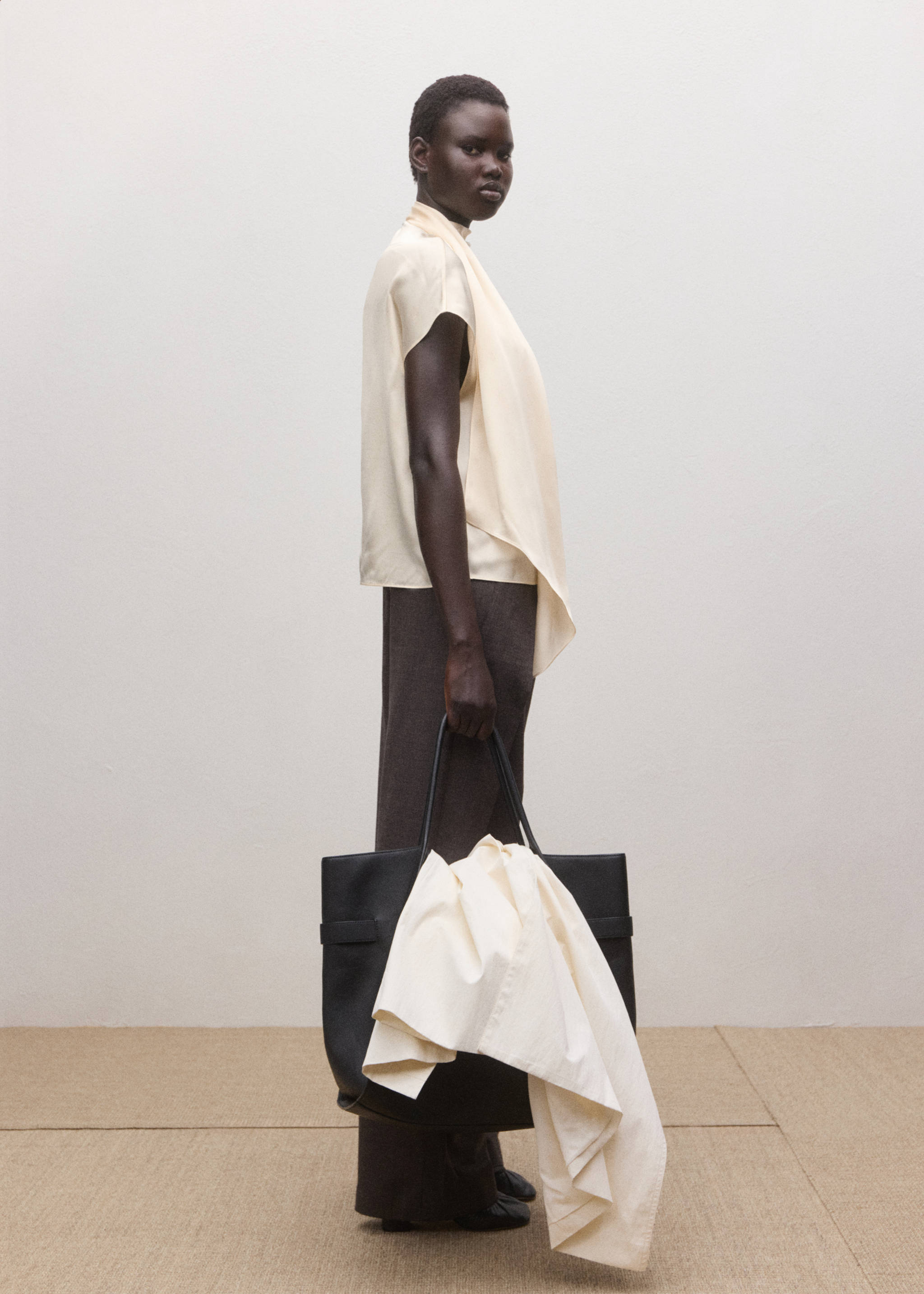 Cream sleeveless blouse with an asymmetrical scarf drape., Ecru. Ref: 27024097-00.