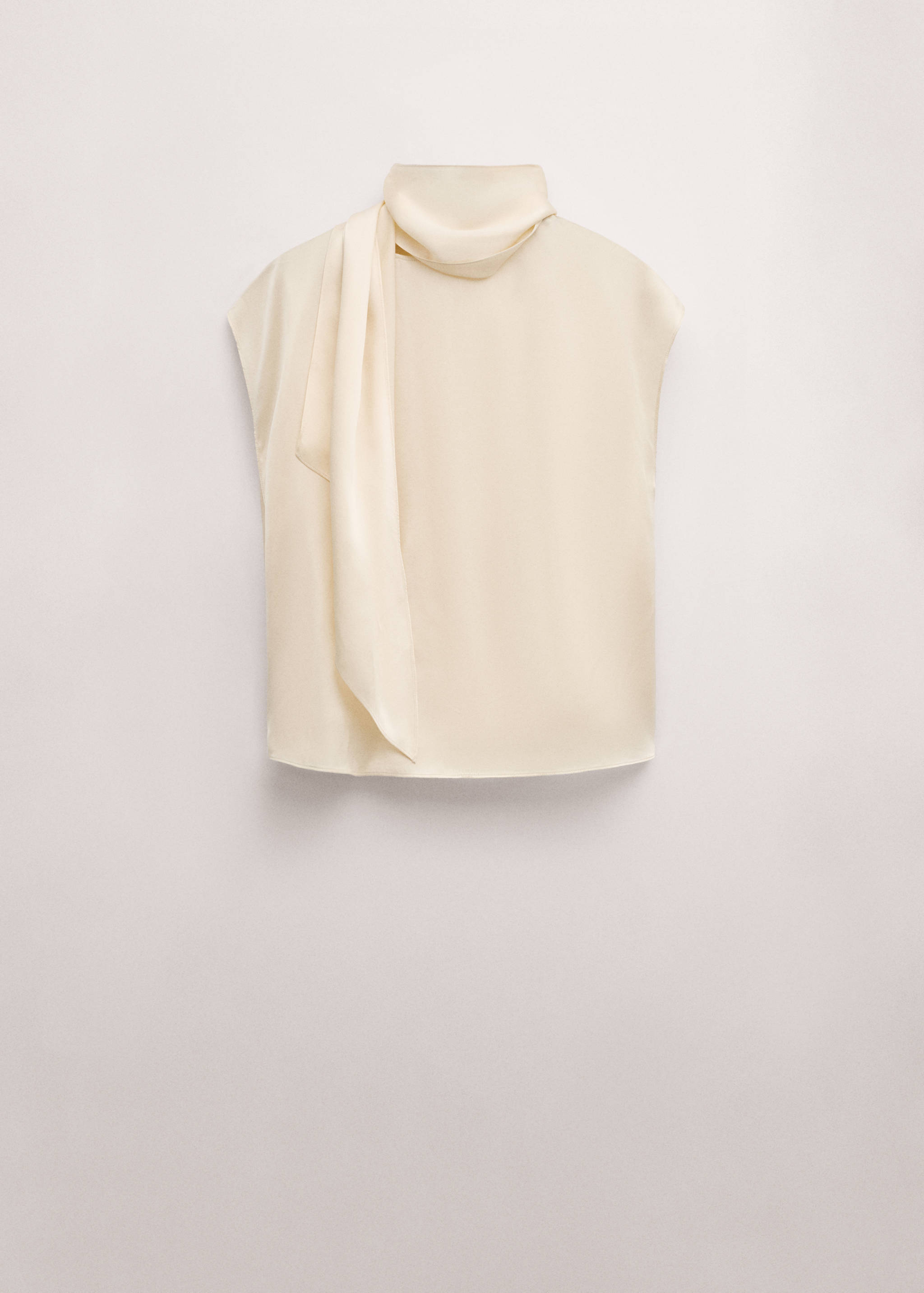 Off-white sleeveless satin blouse with a high collar and draped scarf detail.