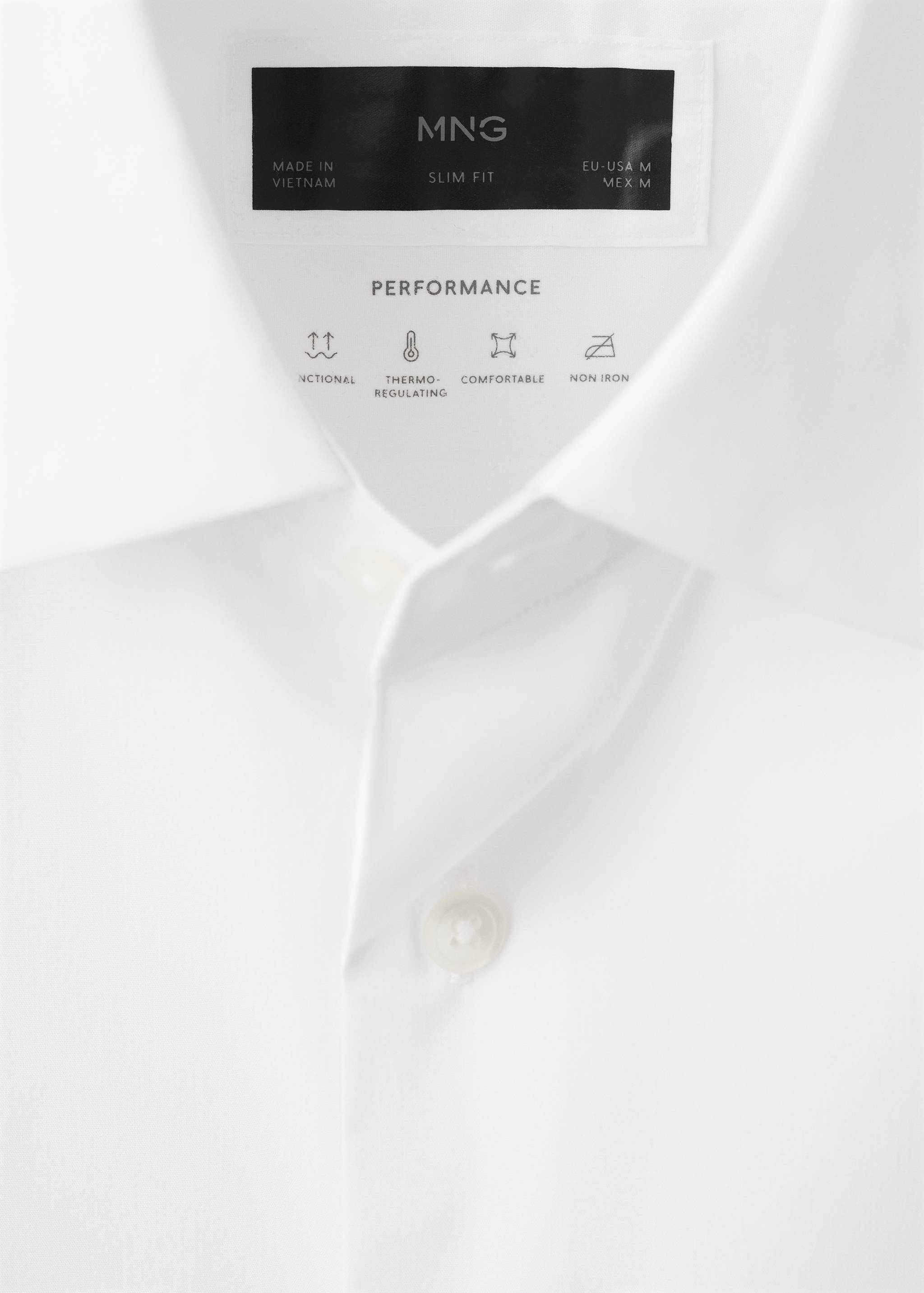 Close-up of a white men's slim fit shirt collar and label detail.