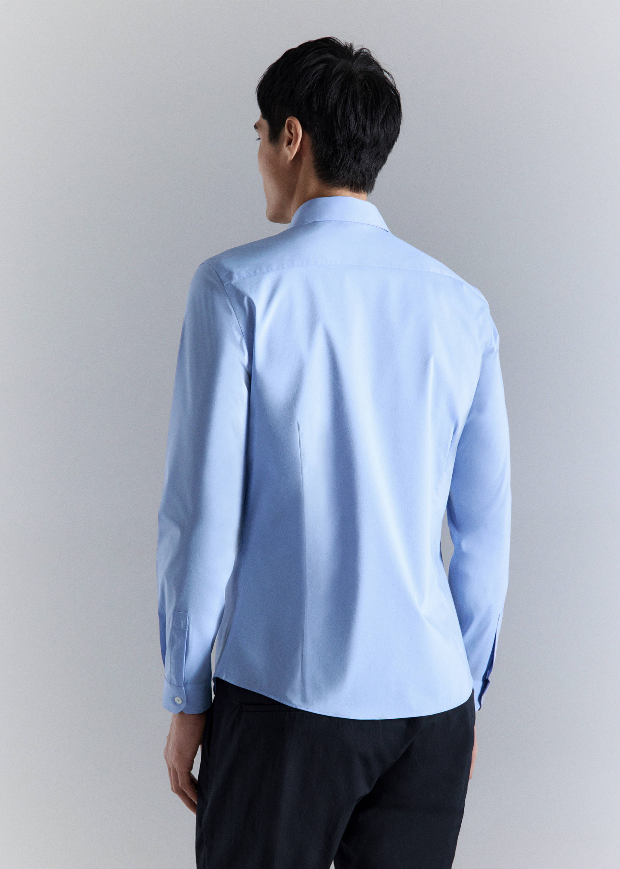 Light blue long-sleeved shirt shown from the back., China Blue. Ref: 27024424-00.