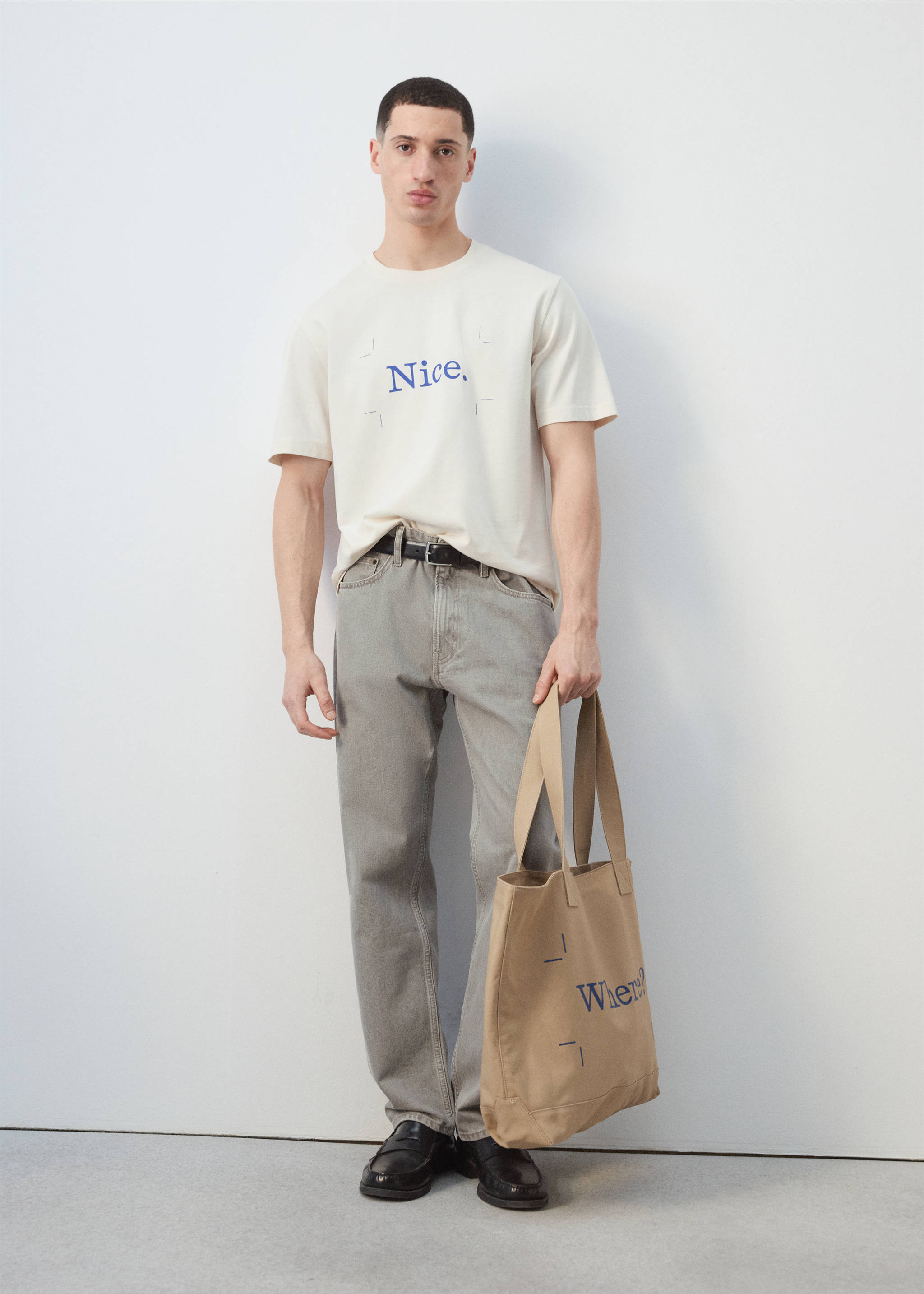 Off-white short-sleeved t-shirt with blue chest text., Off White. Ref: 27025993-00.