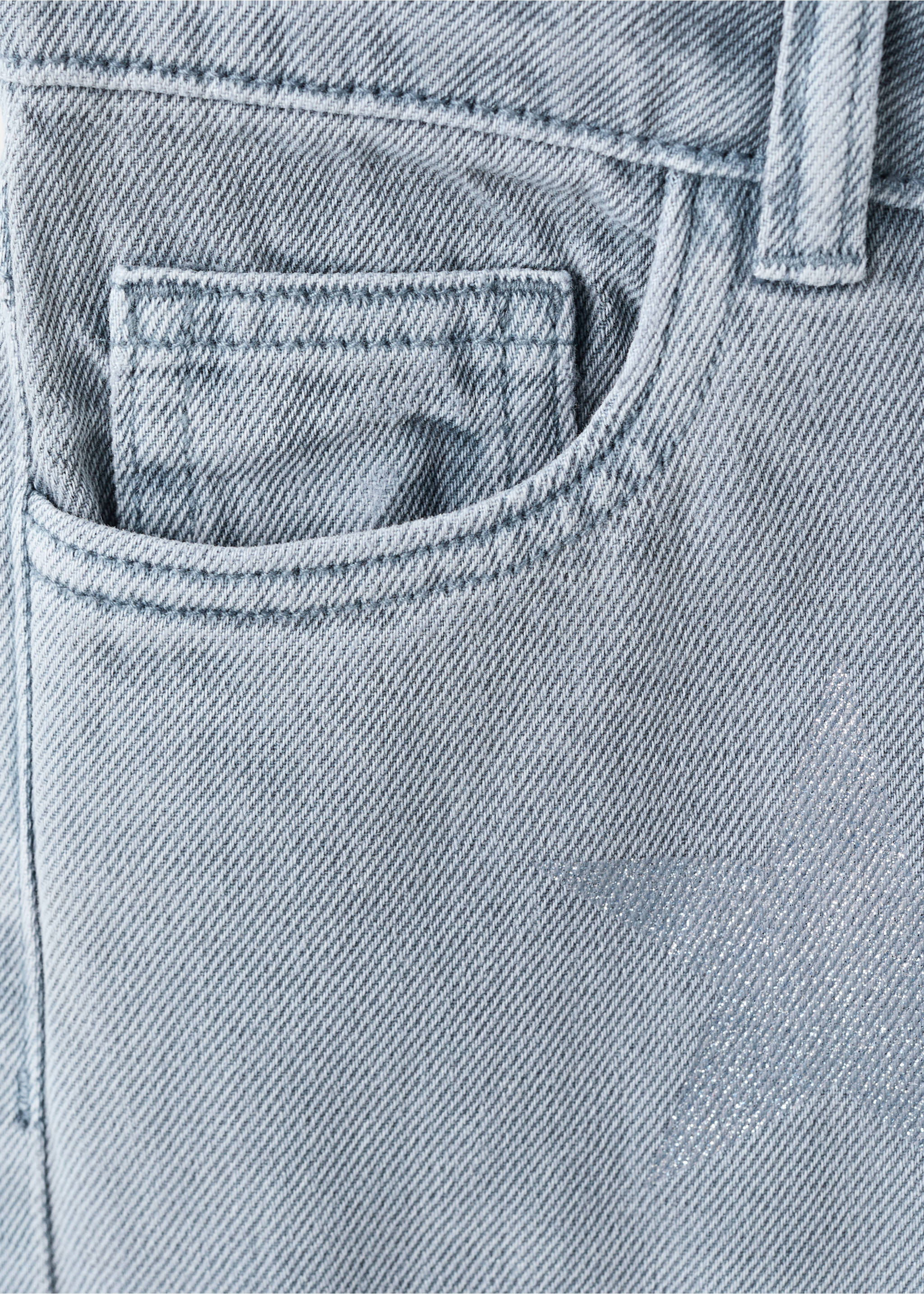 Close-up of light blue denim fabric detail with a coin pocket., Blue. Ref: 27031289-00.