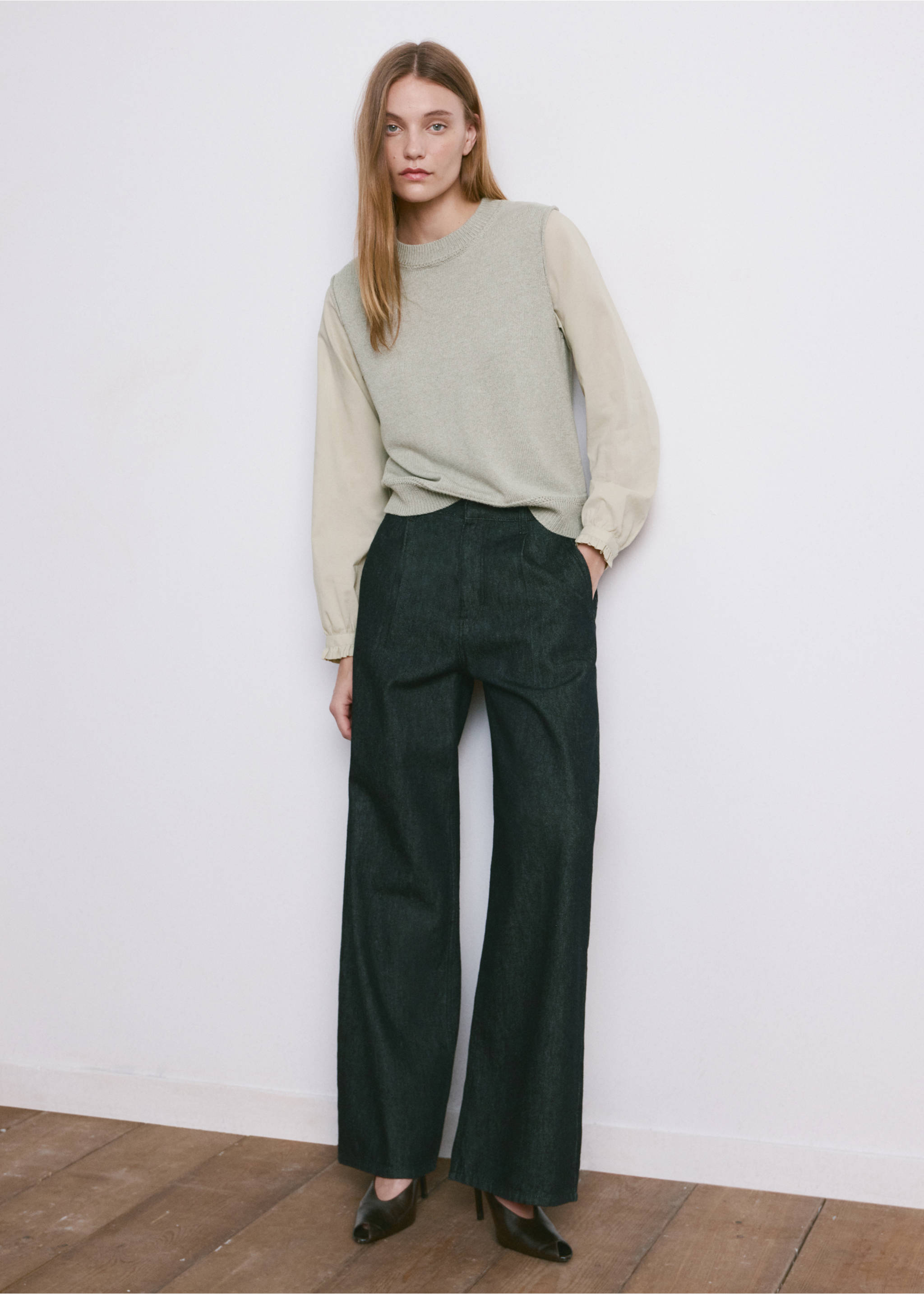 Light green knit jersey sweater vest with long sleeves, worn with dark wide-leg trousers., Aqua Green. Ref: 27034093-00.