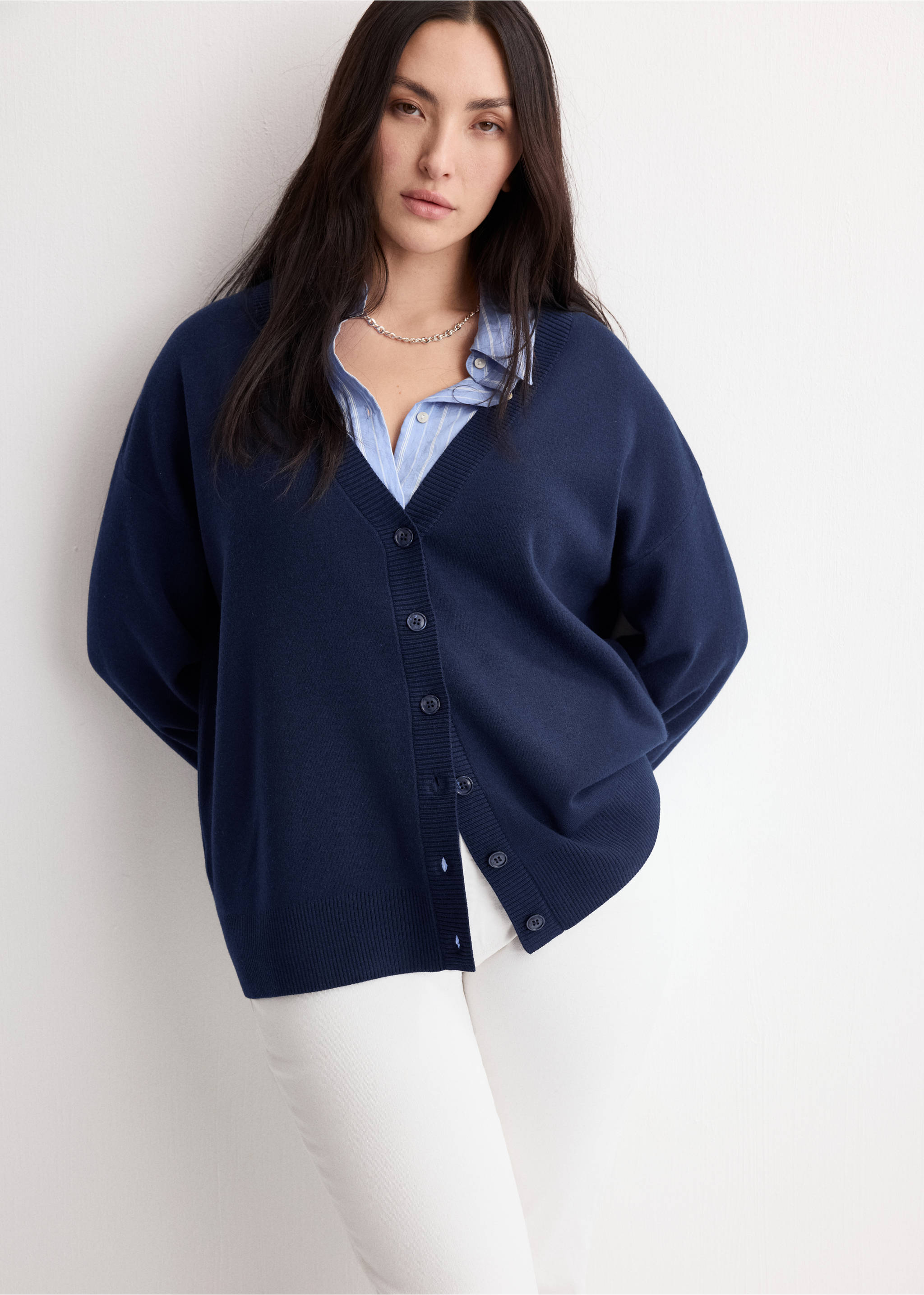 Navy blue V-neck button-up cardigan with ribbed trim., Dark Navy. Ref: 27034774-00.