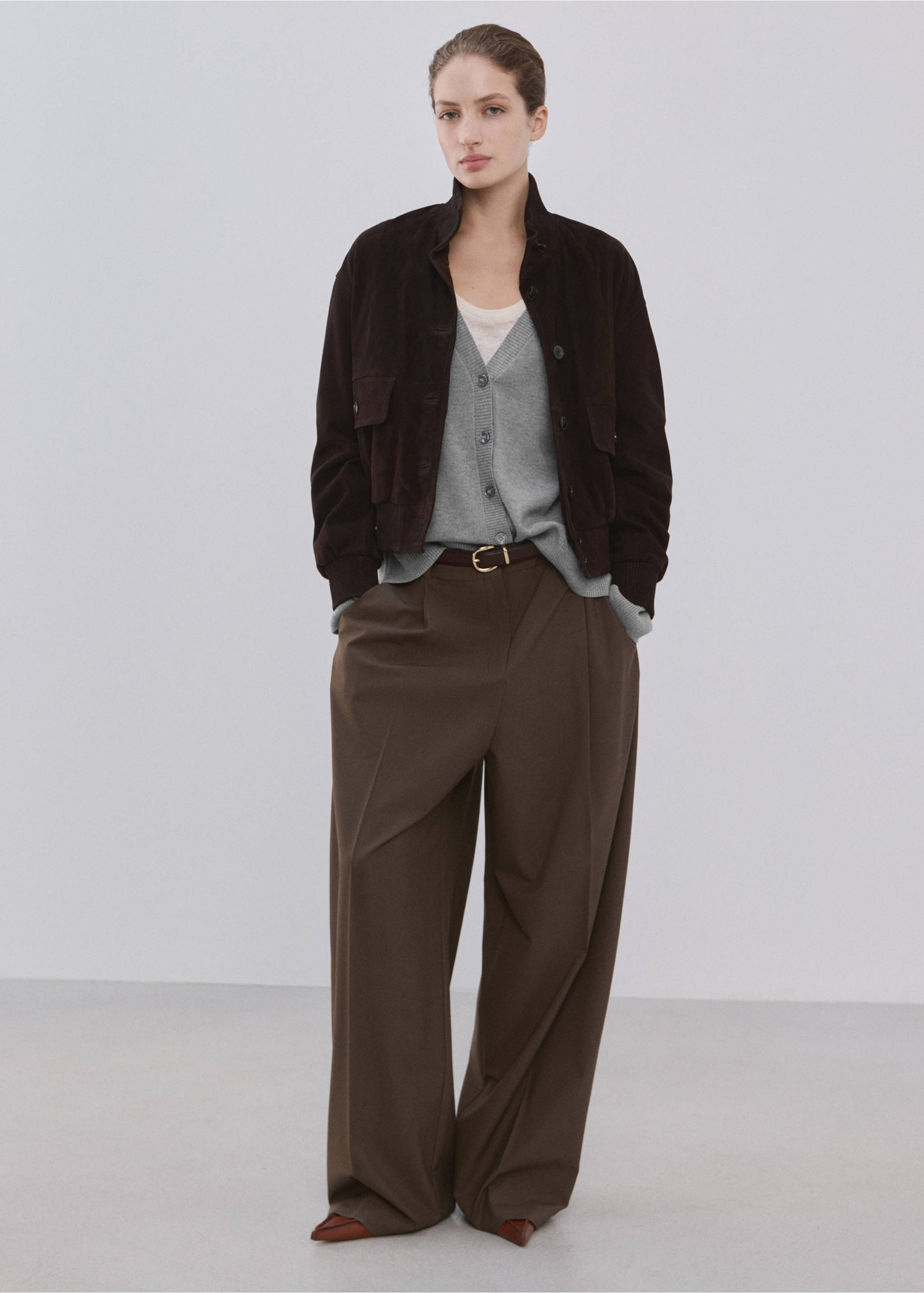 Grey V-neck cardigan worn under a dark brown jacket with trousers., Medium Heather Grey. Ref: 27034774-00.