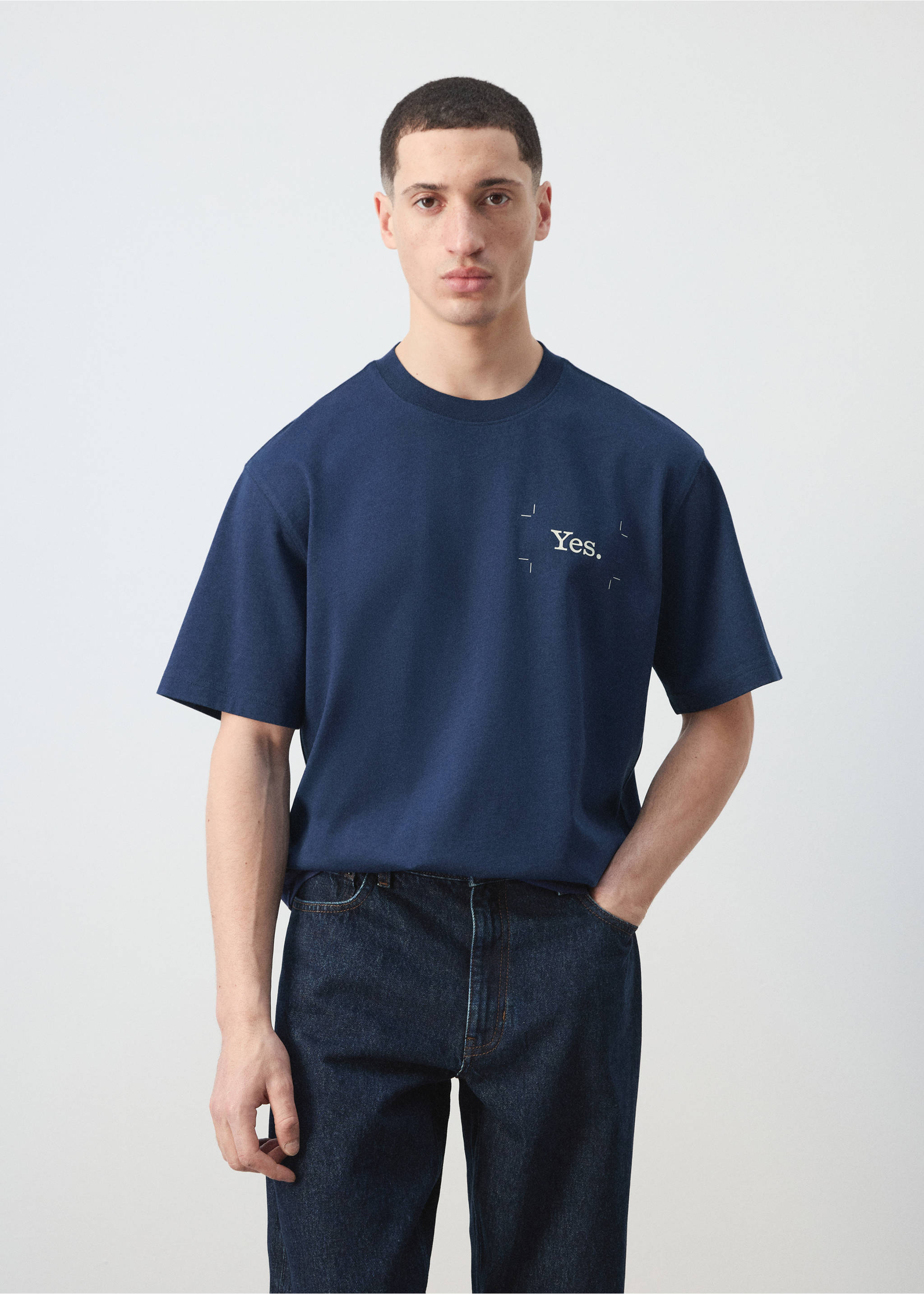 Navy blue relaxed-fit short-sleeved t-shirt with a crew neck and a small front chest graphic., Ink Blue. Ref: 27035991-00.