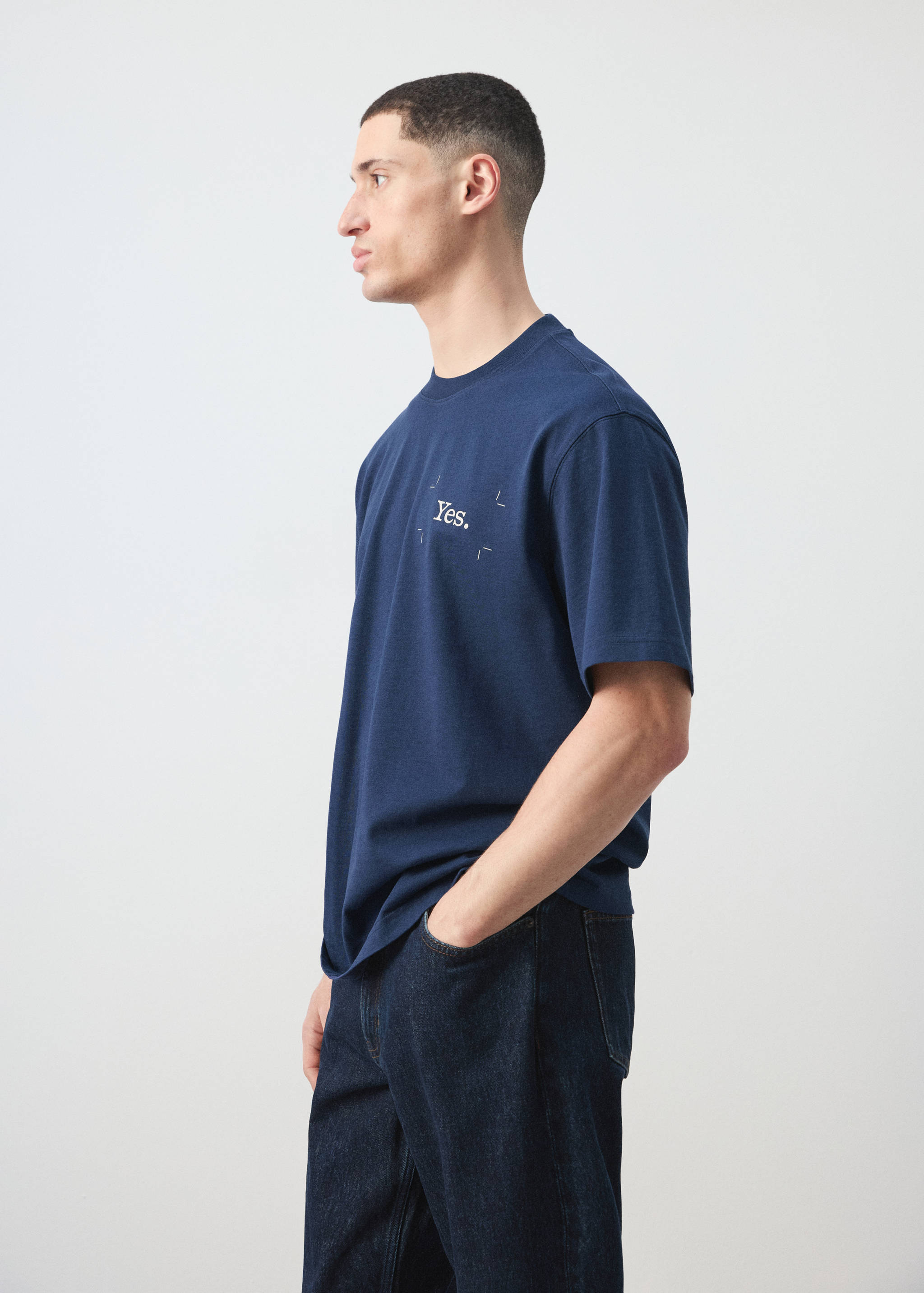 Dark blue short-sleeved t-shirt with crew neck and small chest text.