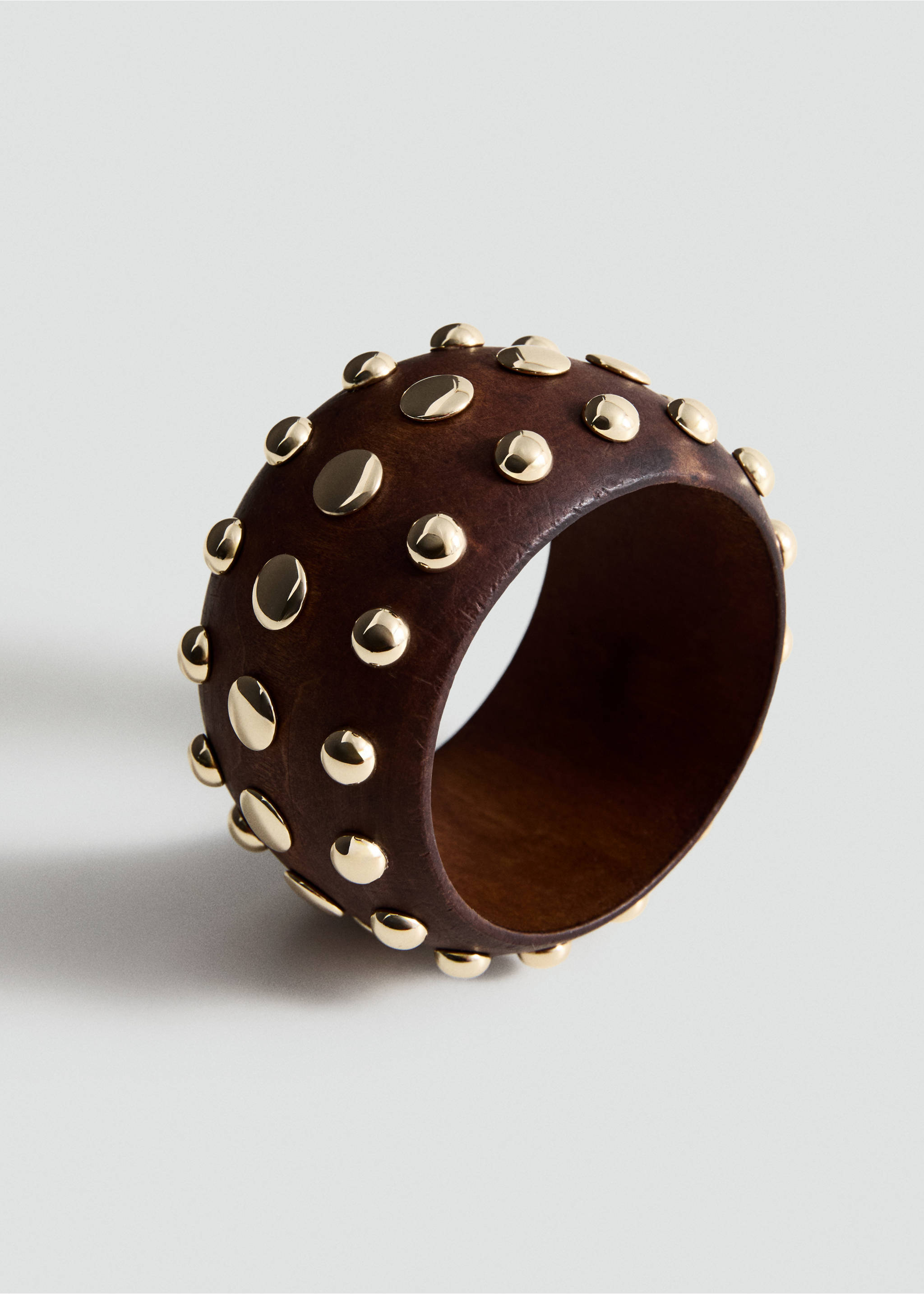 Dark brown bangle bracelet with polished gold-coloured studs., Brown. Ref: 27036357-00.