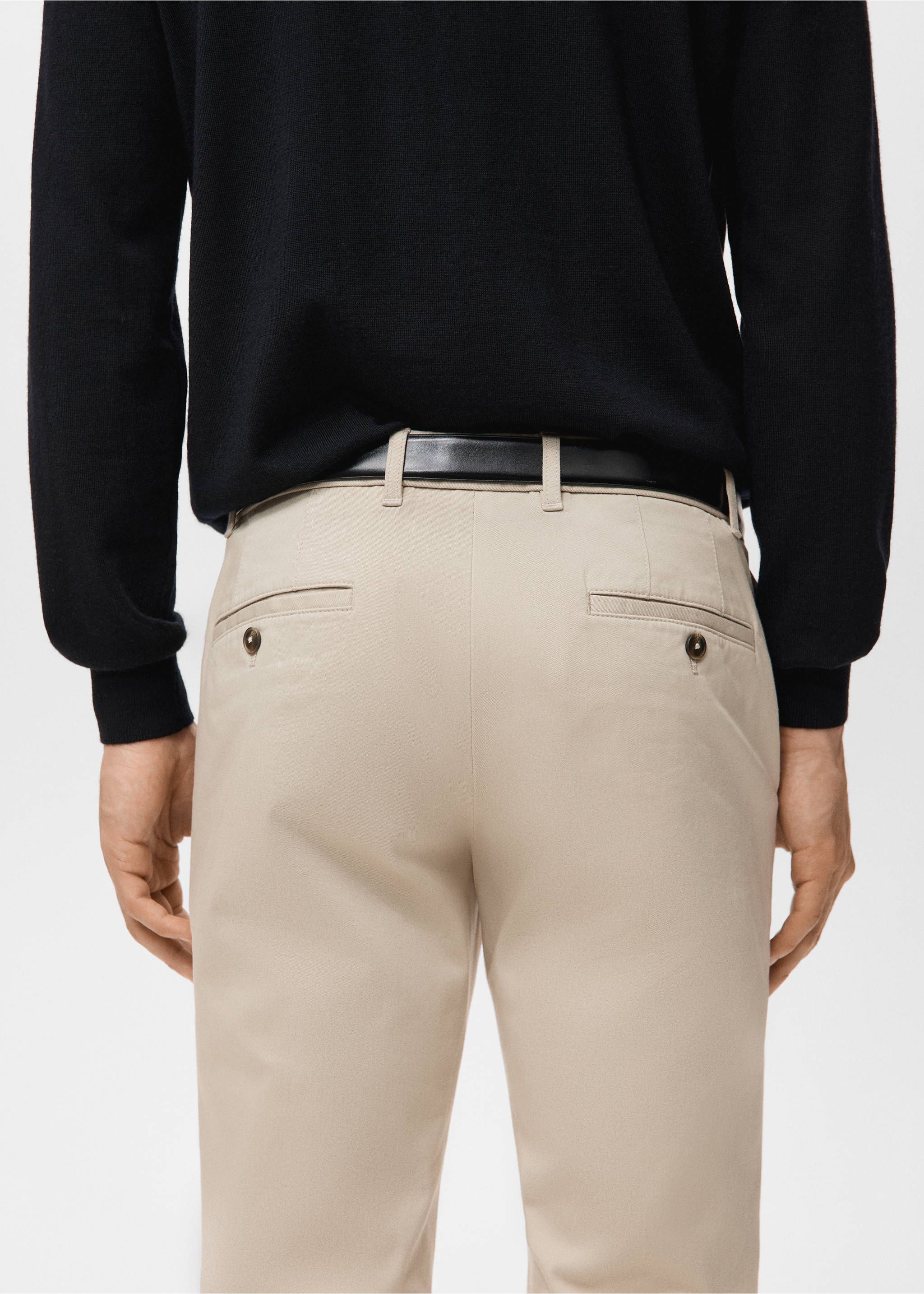 Beige trousers with back welt pockets, viewed from behind., Sand. Ref: 27041187-00.