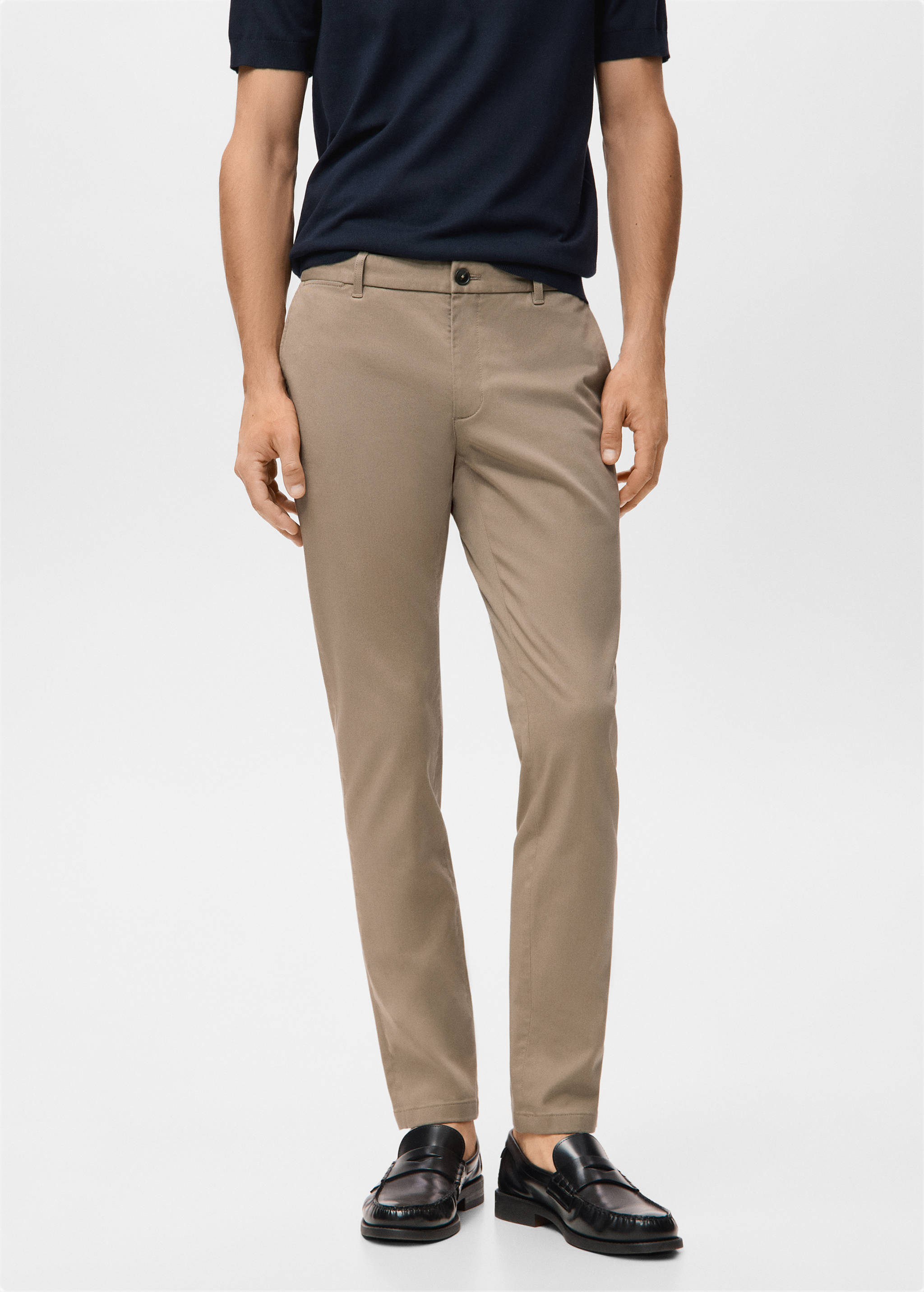 Taupe slim-fit trousers with belt loops and a button fly.