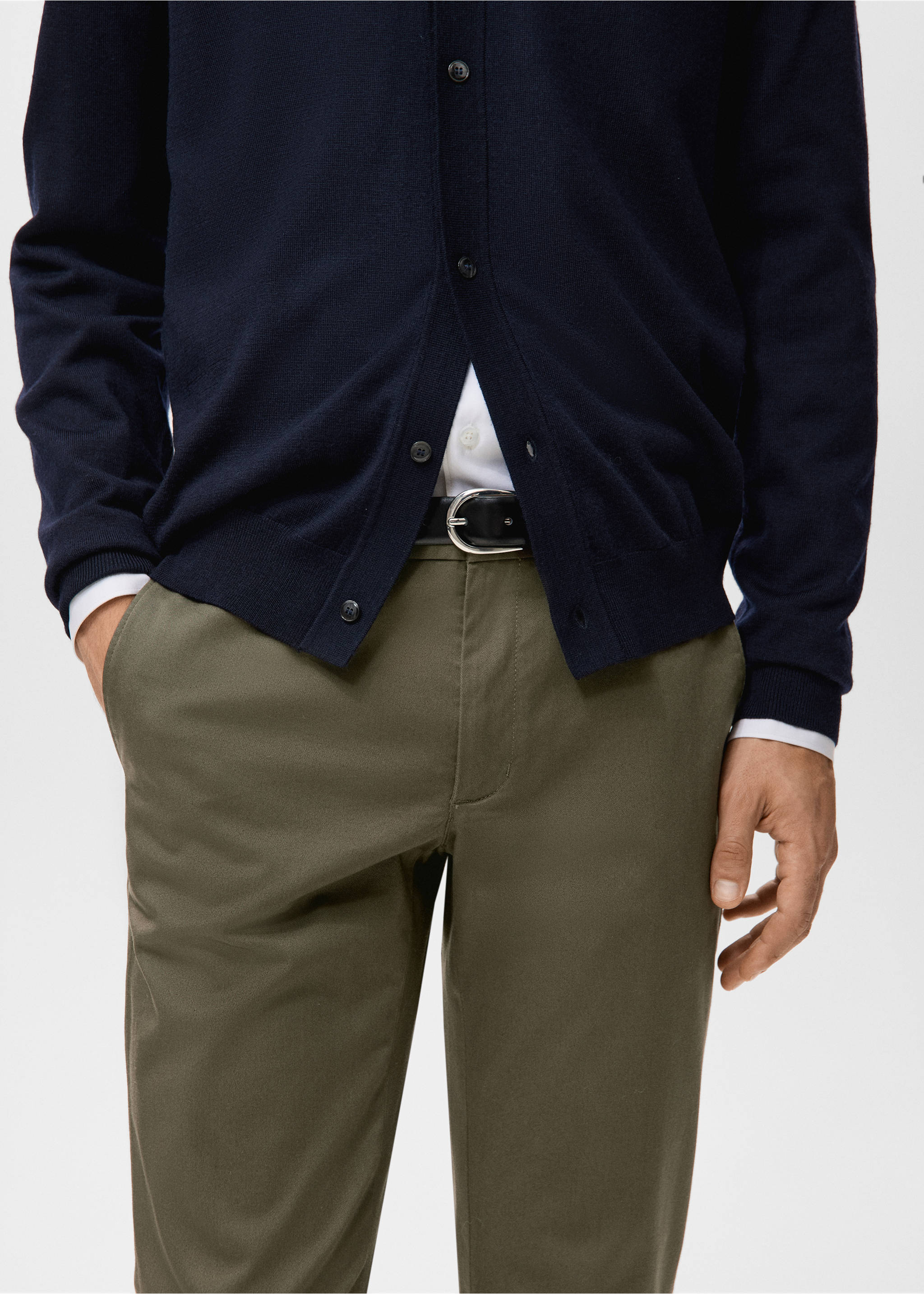 Dark olive green trousers paired with a black belt and navy cardigan., Khaki. Ref: 27041187-00.