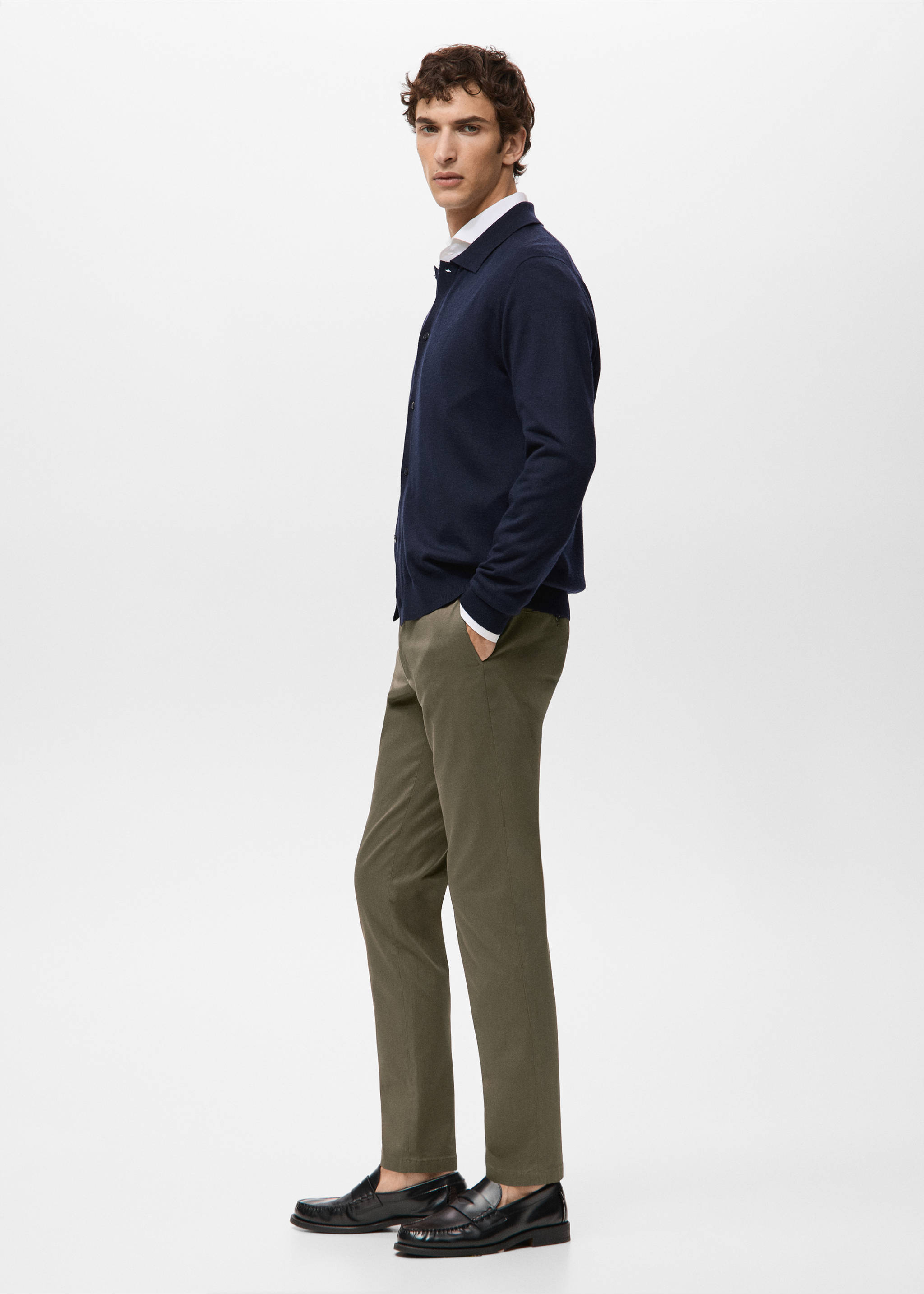 Olive green trousers in a straight fit, worn with a navy cardigan and loafers., Khaki. Ref: 27041187-00.