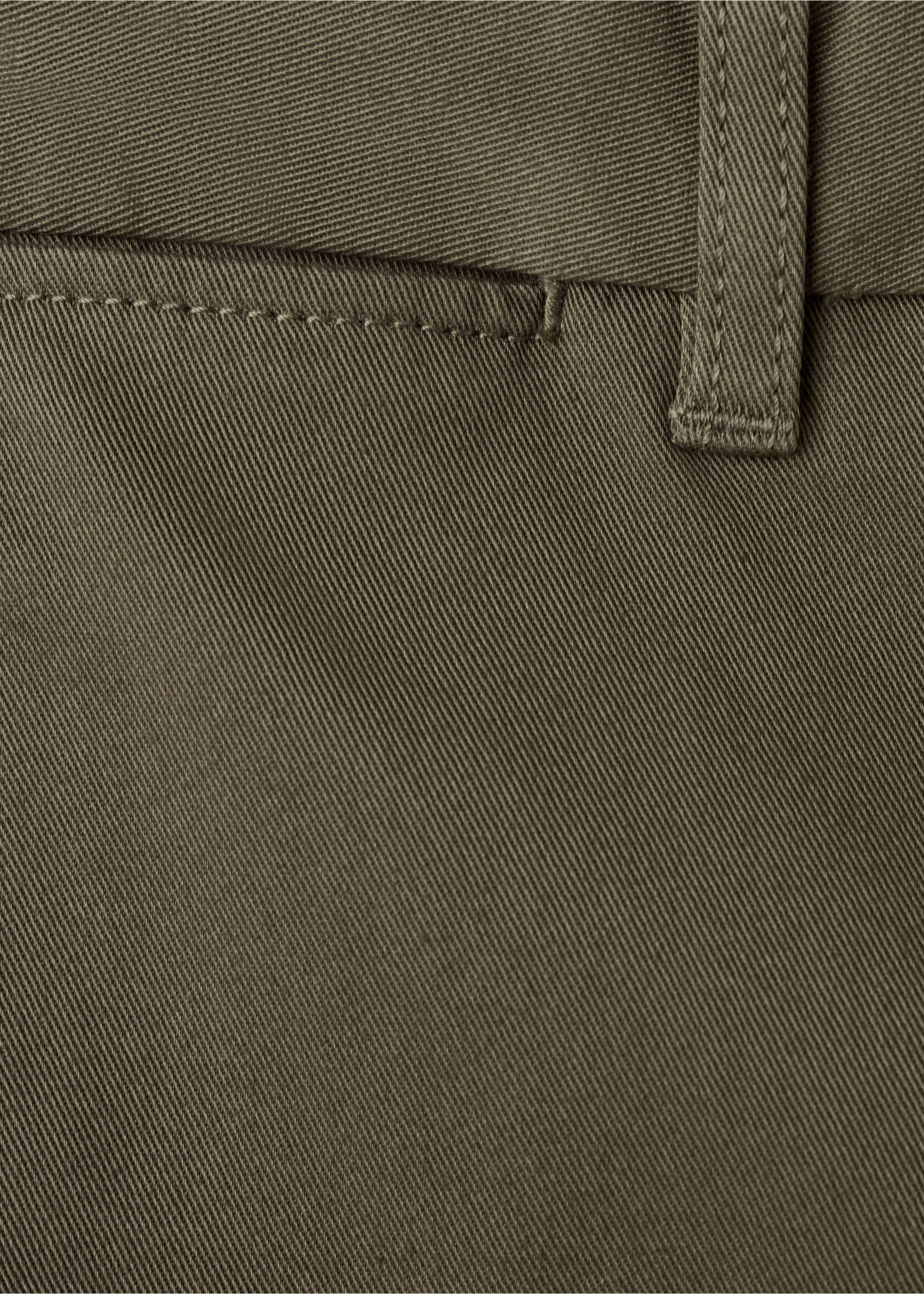 Close-up of olive green trousers fabric showing twill weave., Khaki. Ref: 27041187-00.