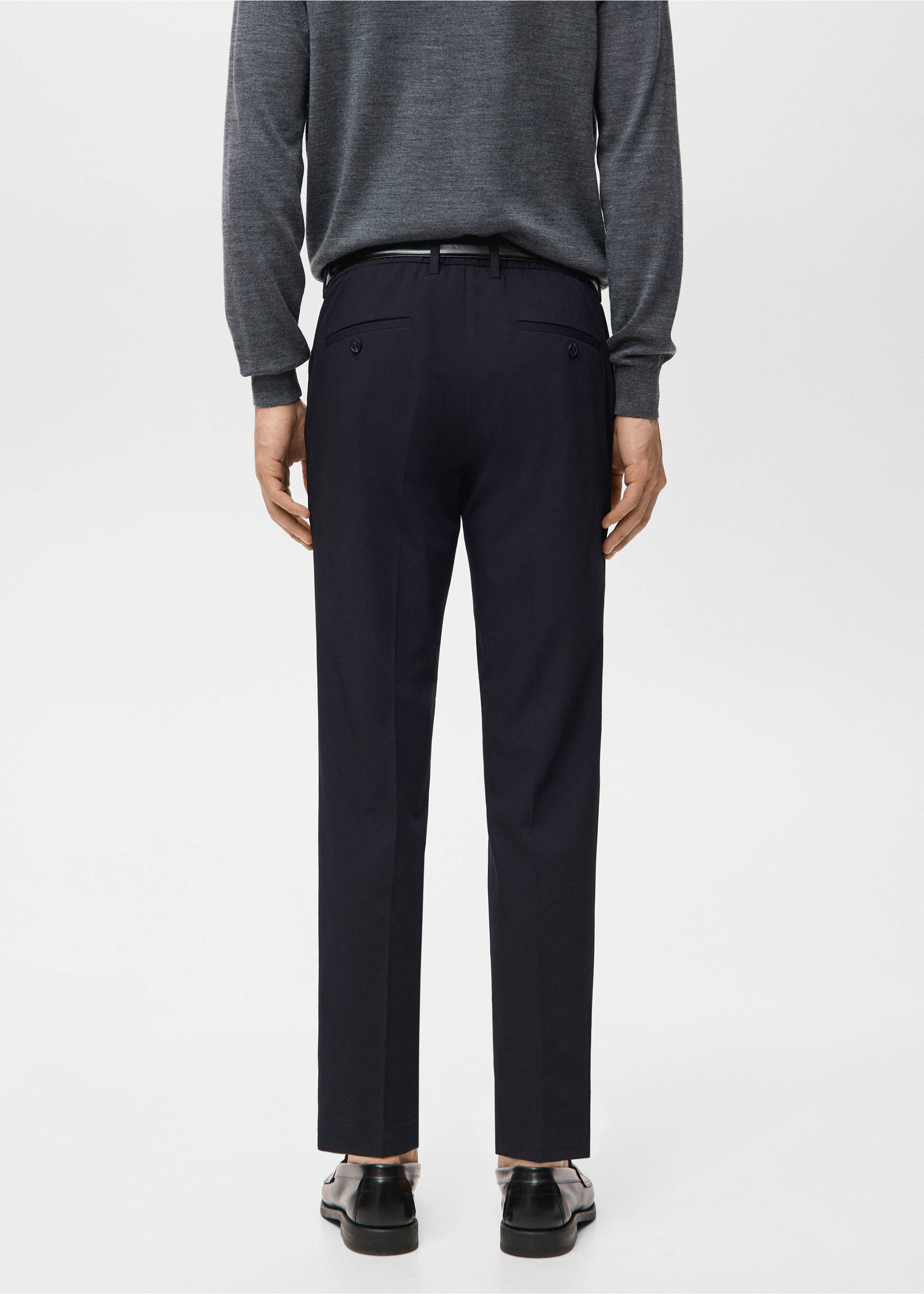 Dark navy blue tailored trousers, shown from the back with welt pockets., Navy. Ref: 27041187-00.