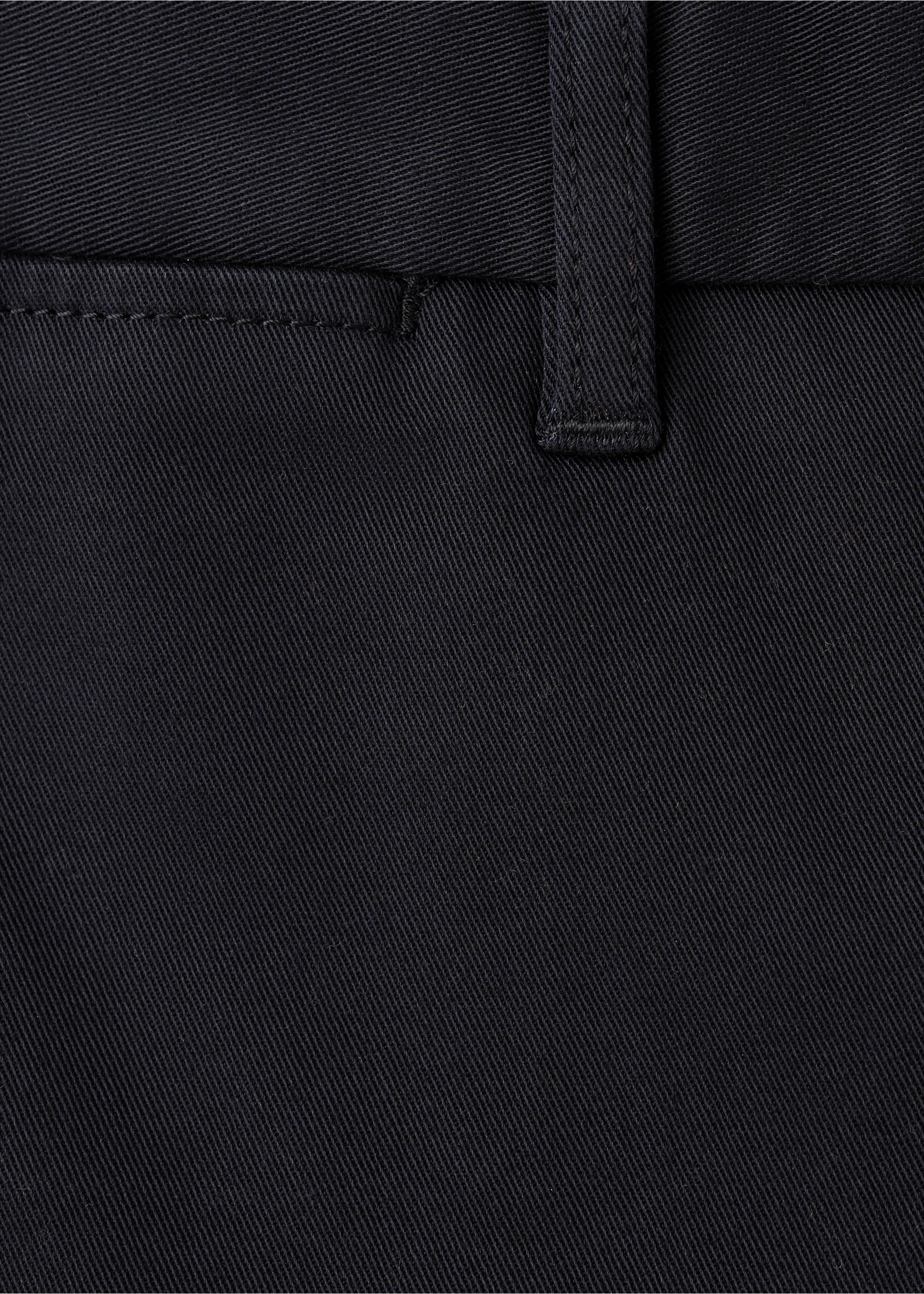 Close-up of black trousers showing the waistband detail and belt loop., Navy. Ref: 27041187-00.