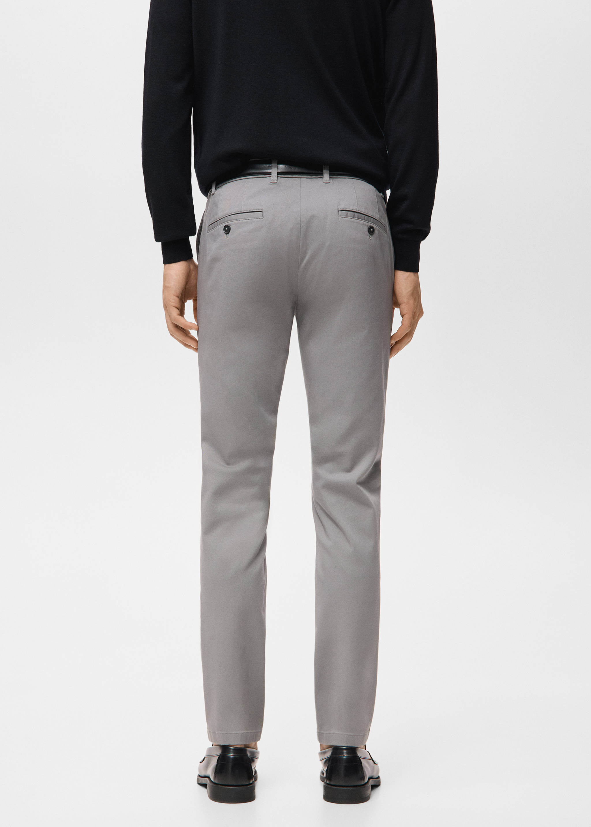 Grey slim-fit trousers viewed from the back.