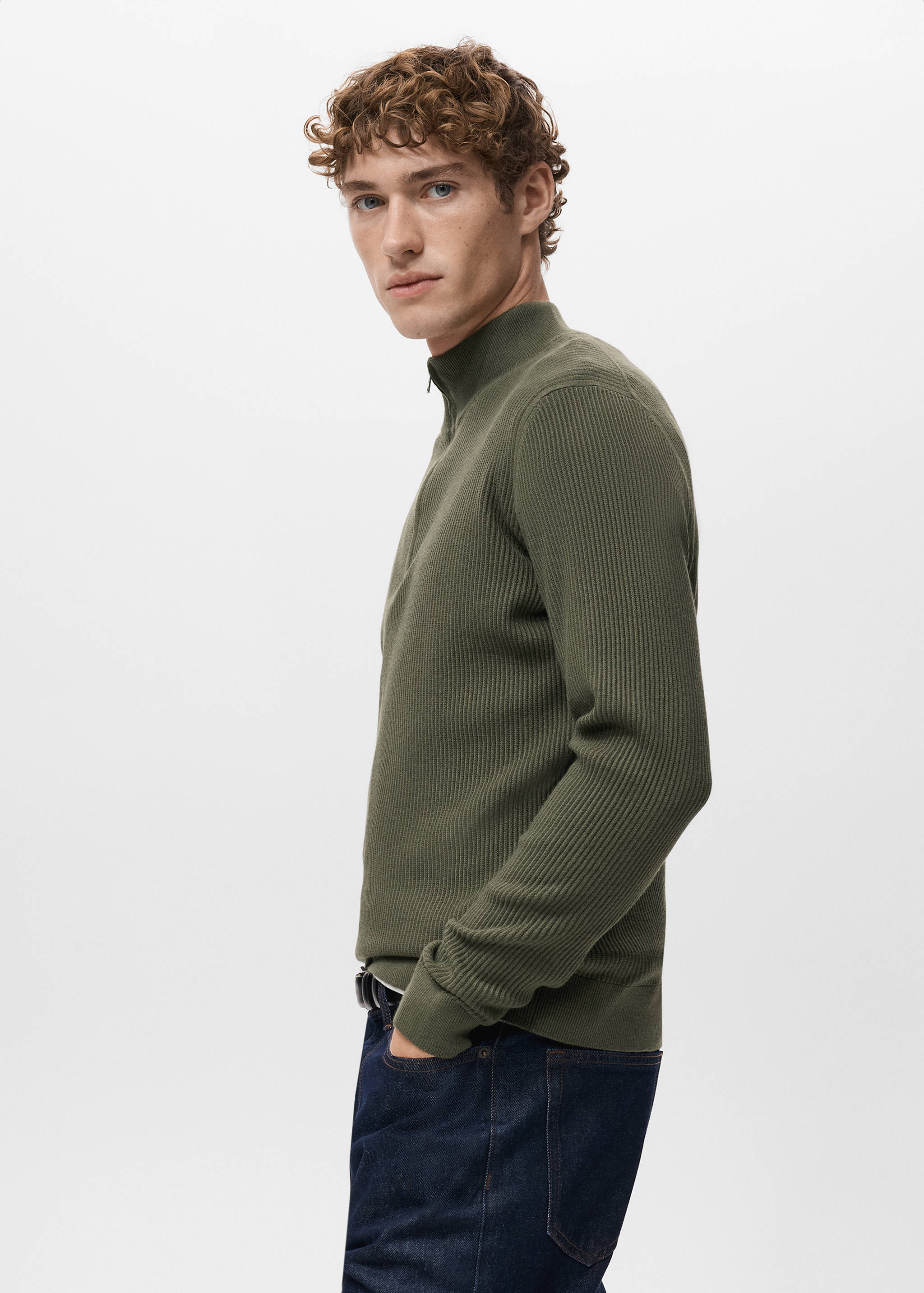 Dark olive green ribbed knit jersey with a high collar and short zip.