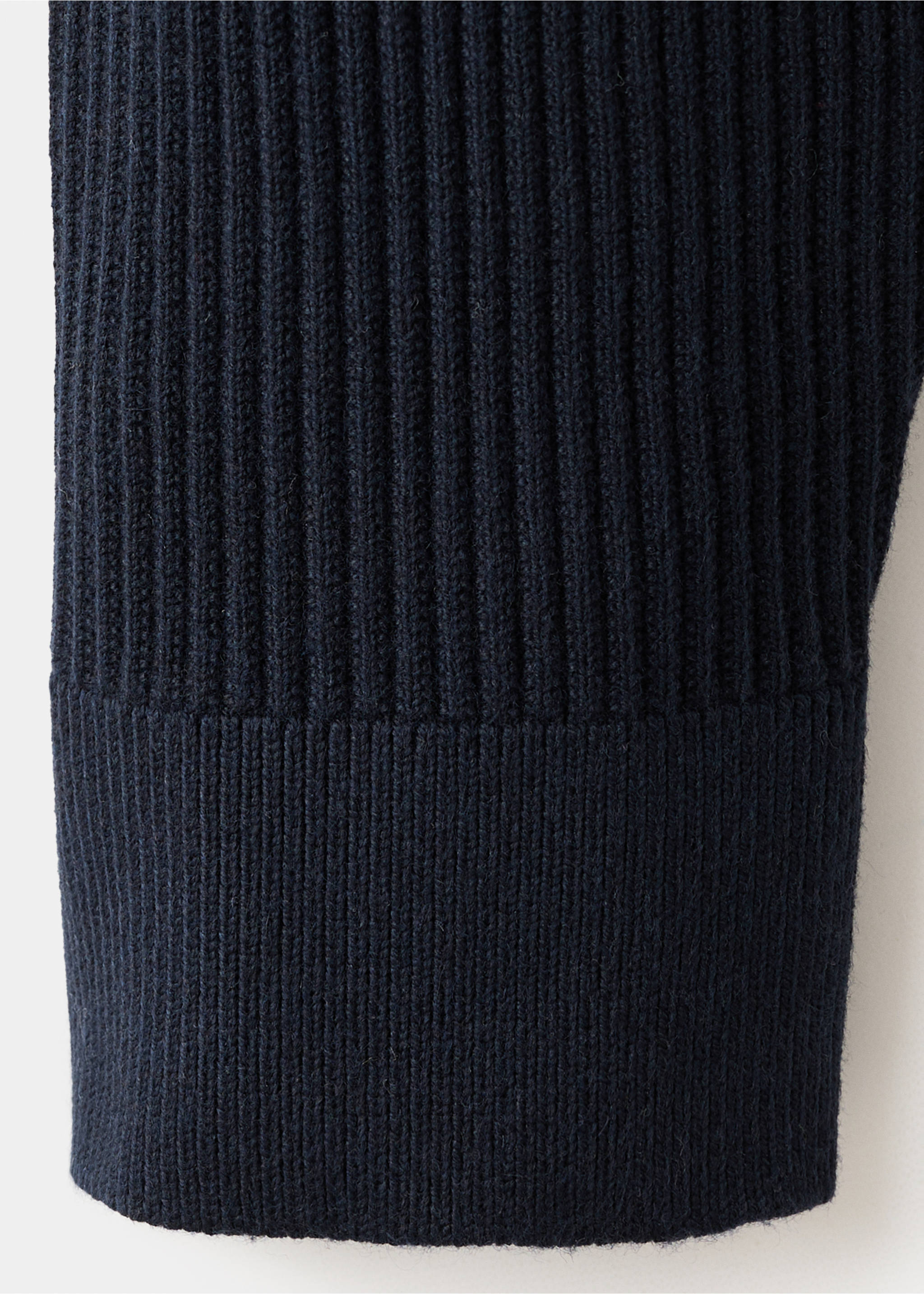 Close-up of navy blue men's knitted jersey fabric and cuff., Navy. Ref: 27041283-00.