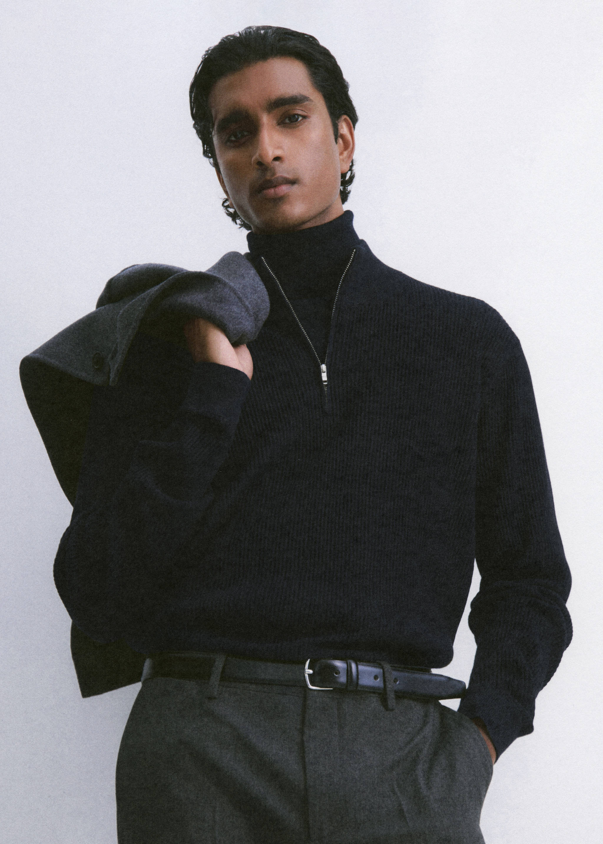 Navy blue knitted zip-neck jersey in a ribbed texture.