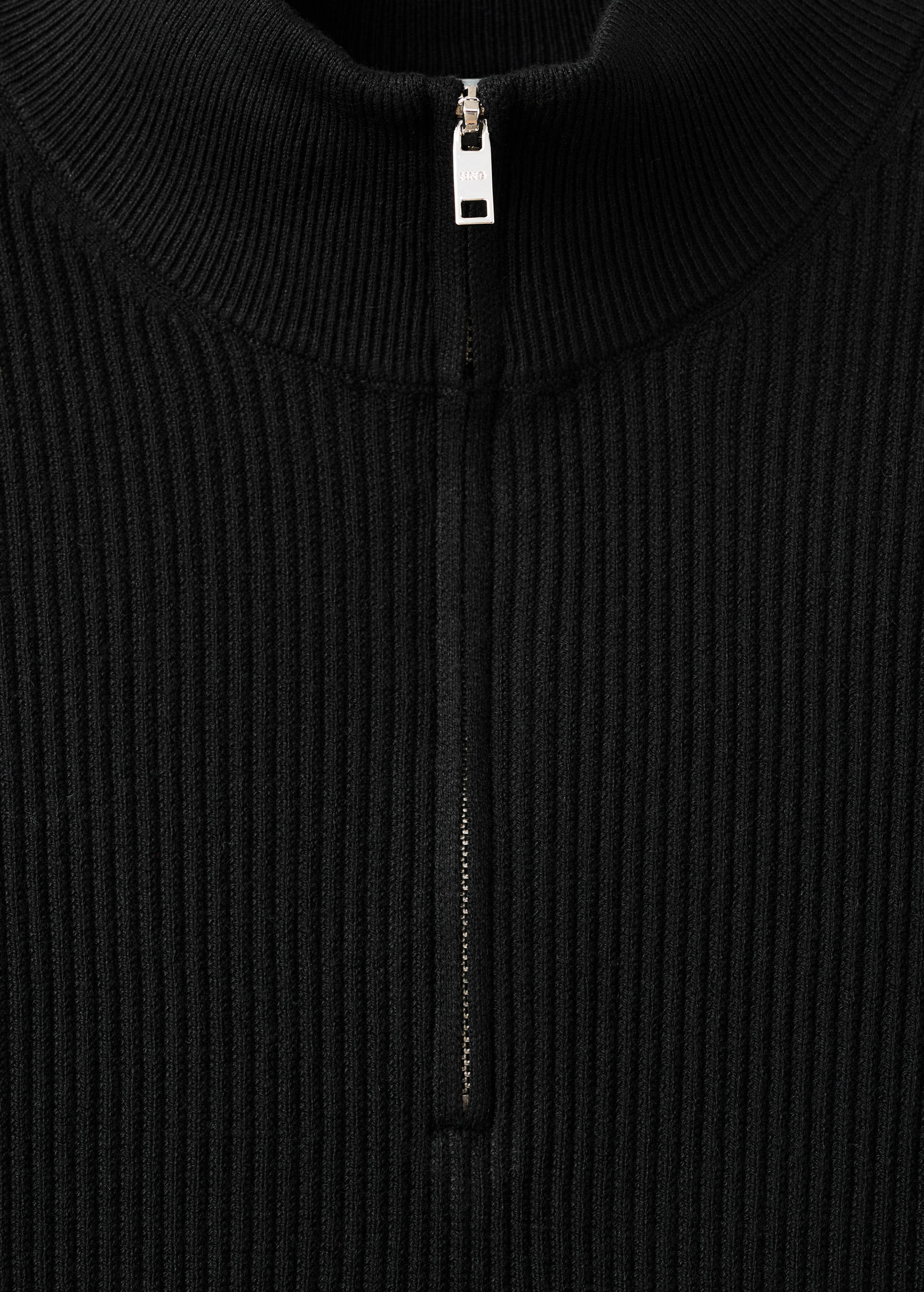 Black ribbed jersey zip-up collar detail