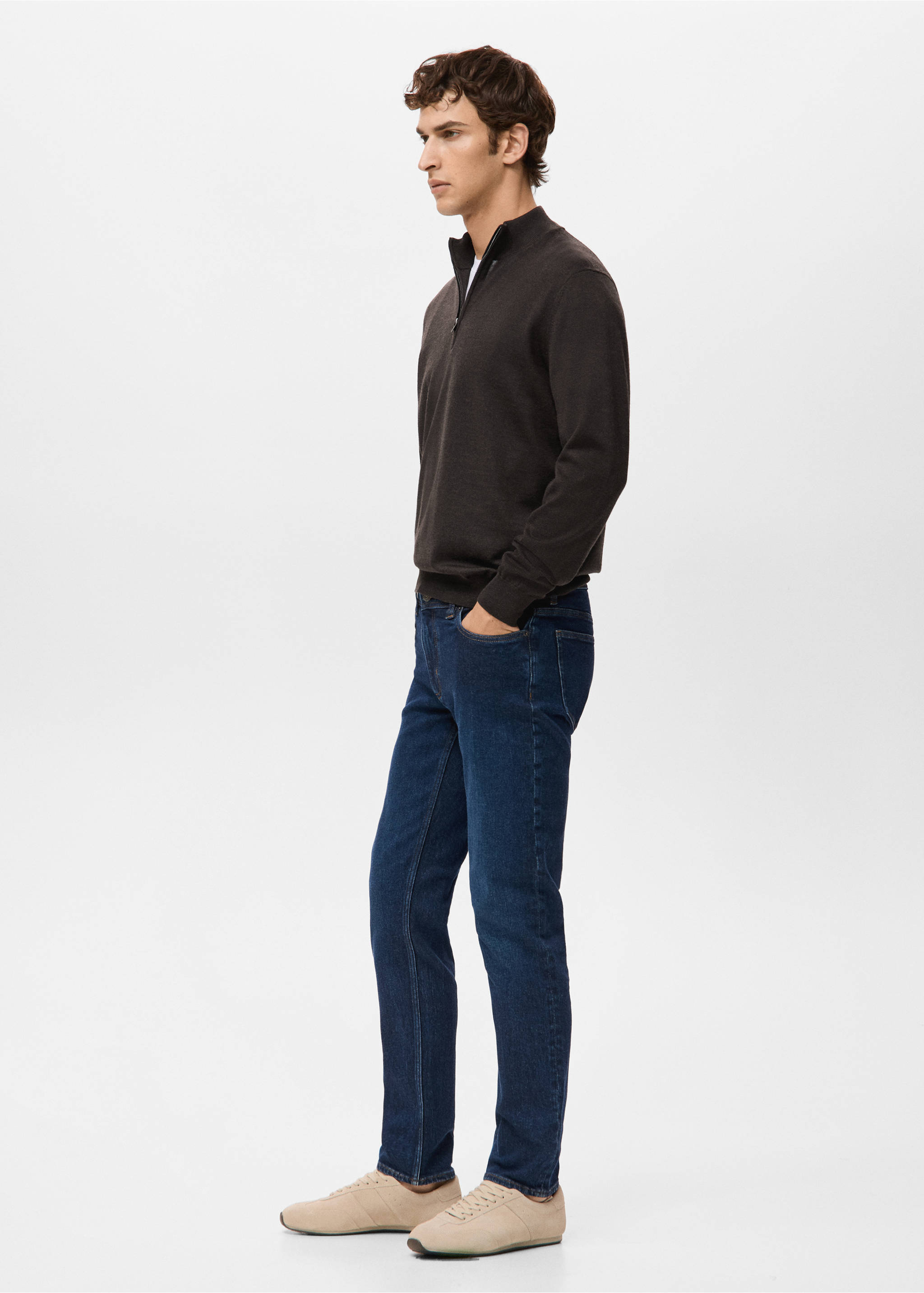 Dark brown knitted zip-neck jersey with long sleeves worn with blue jeans., Chocolate. Ref: 27041285-00.