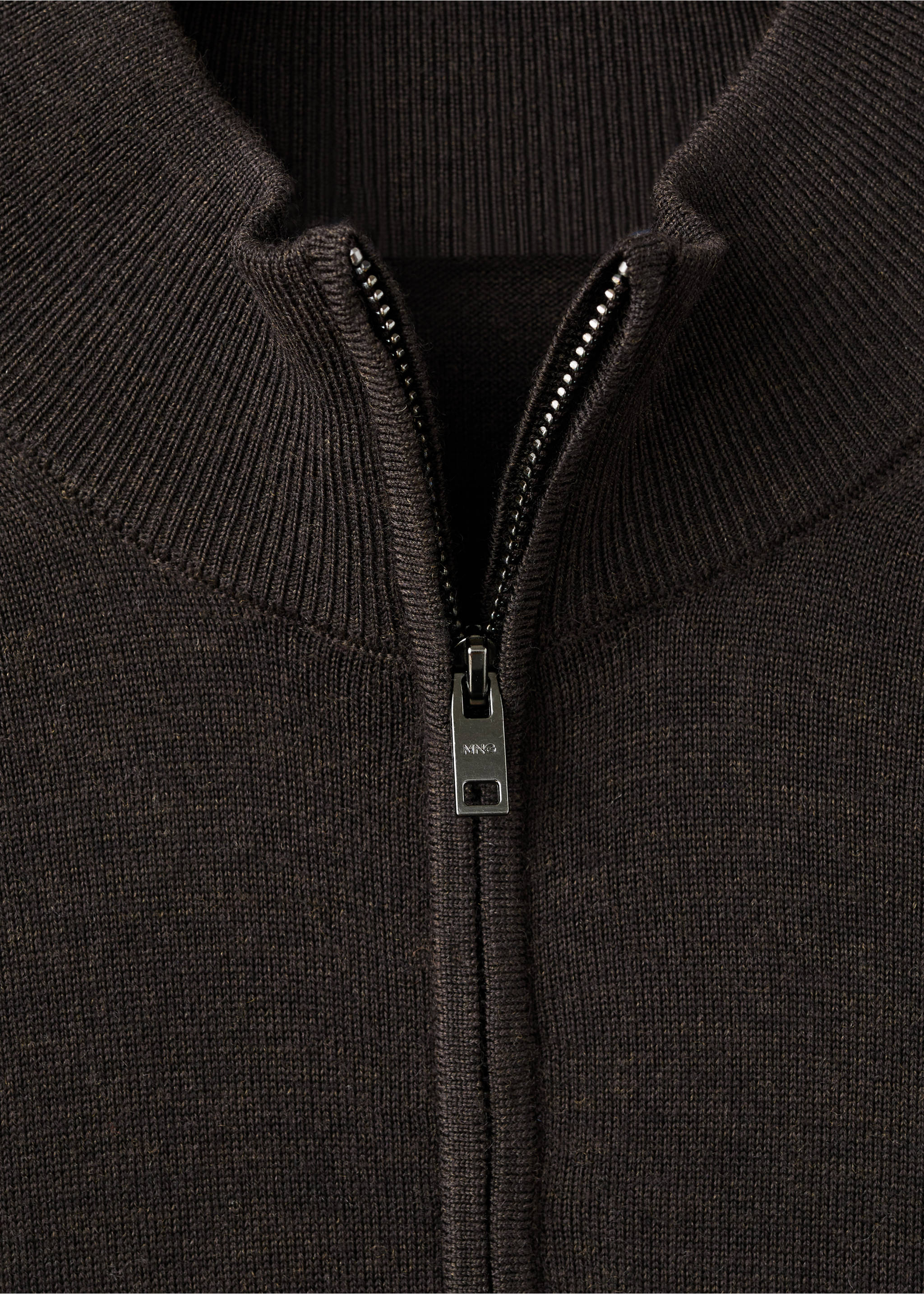 Close-up of a dark brown men's knitted jersey with a ribbed high neck and half-zip., Chocolate. Ref: 27041285-00.