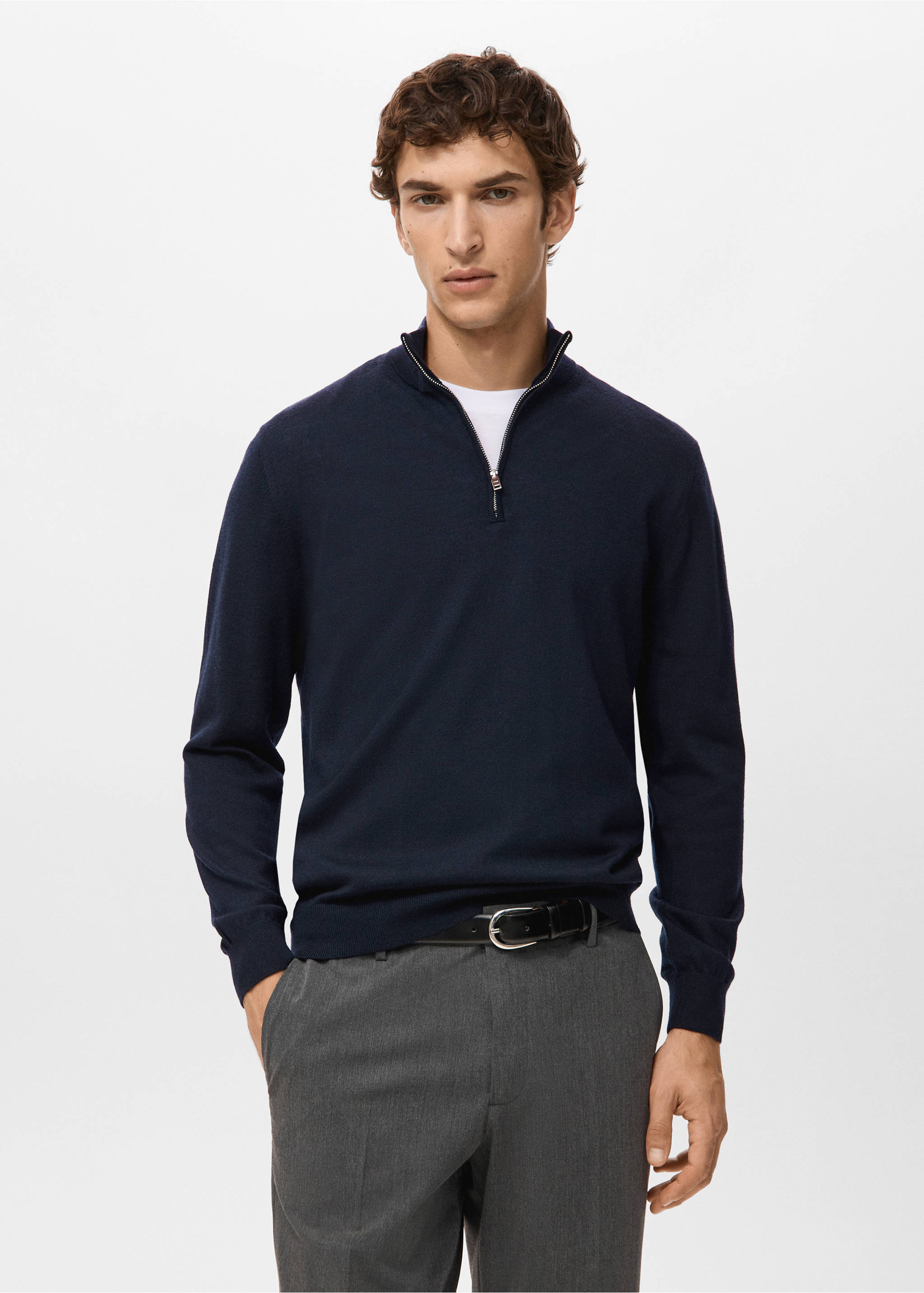 Navy blue knit jersey with a zip-up high collar, worn over a white t-shirt., Navy. Ref: 27041285-00.