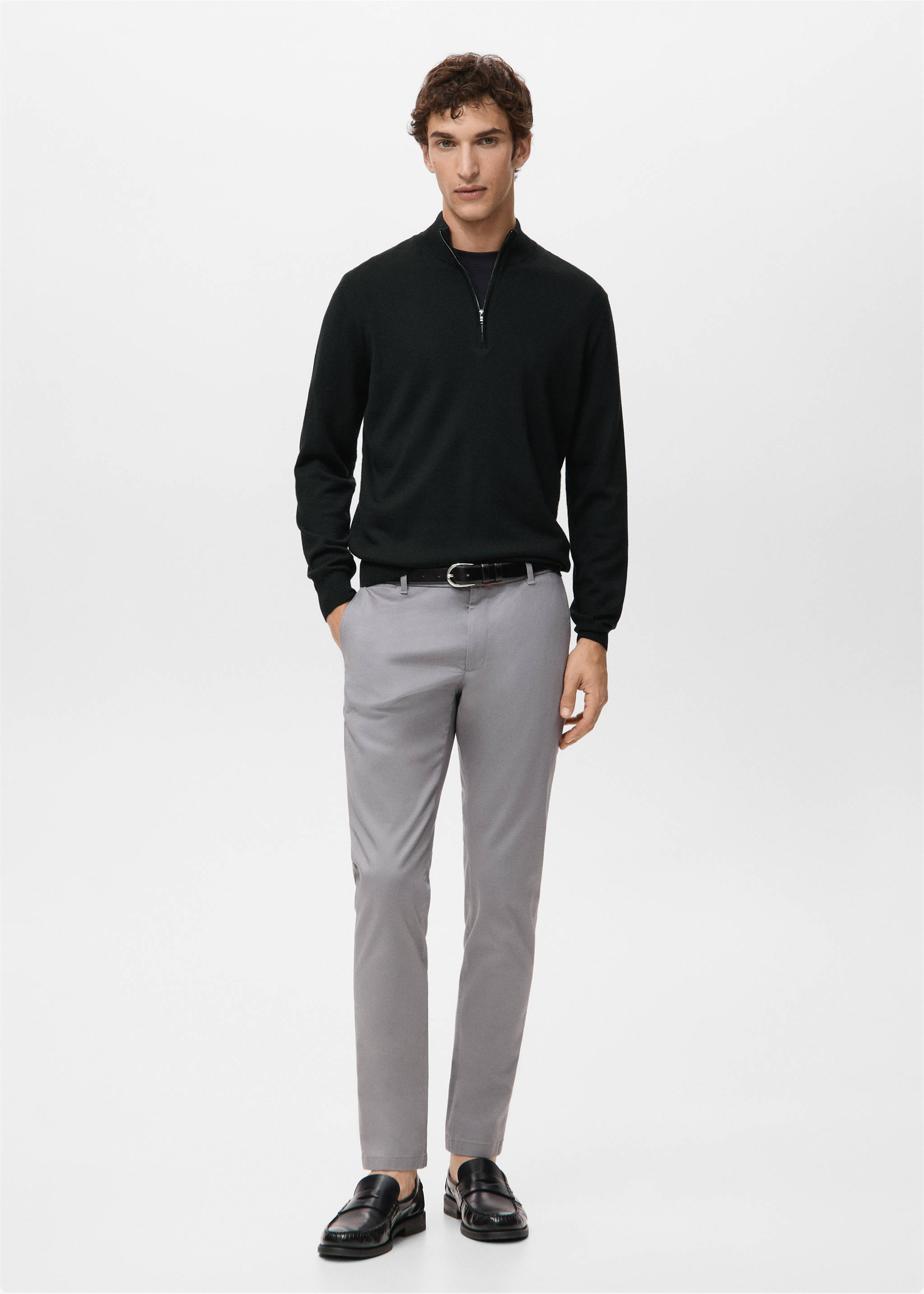 Black zip-neck jersey worn with grey trousers and a black belt, Black. Ref: 27041285-00.
