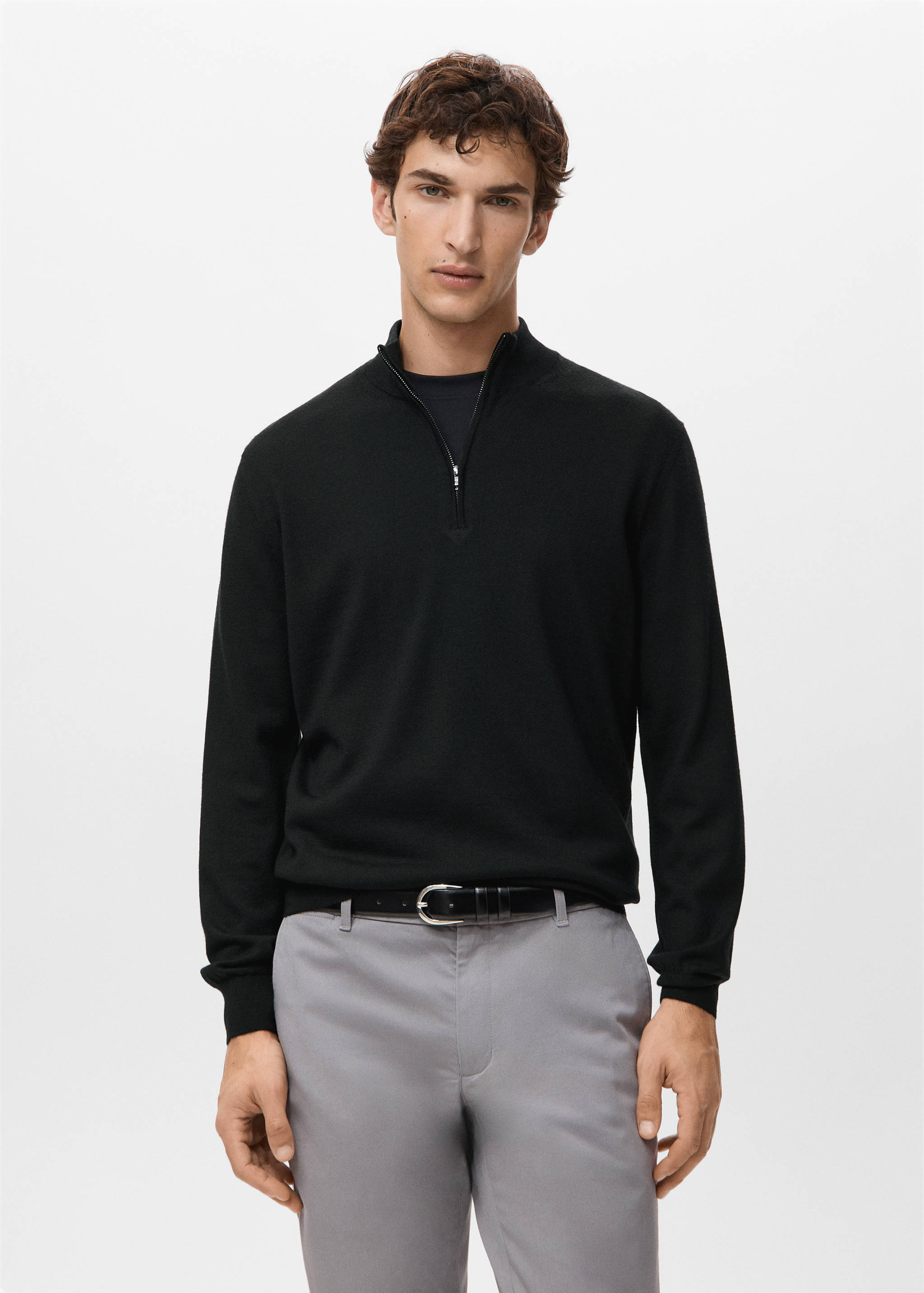 Black long-sleeved jersey with a quarter-zip mock neck.