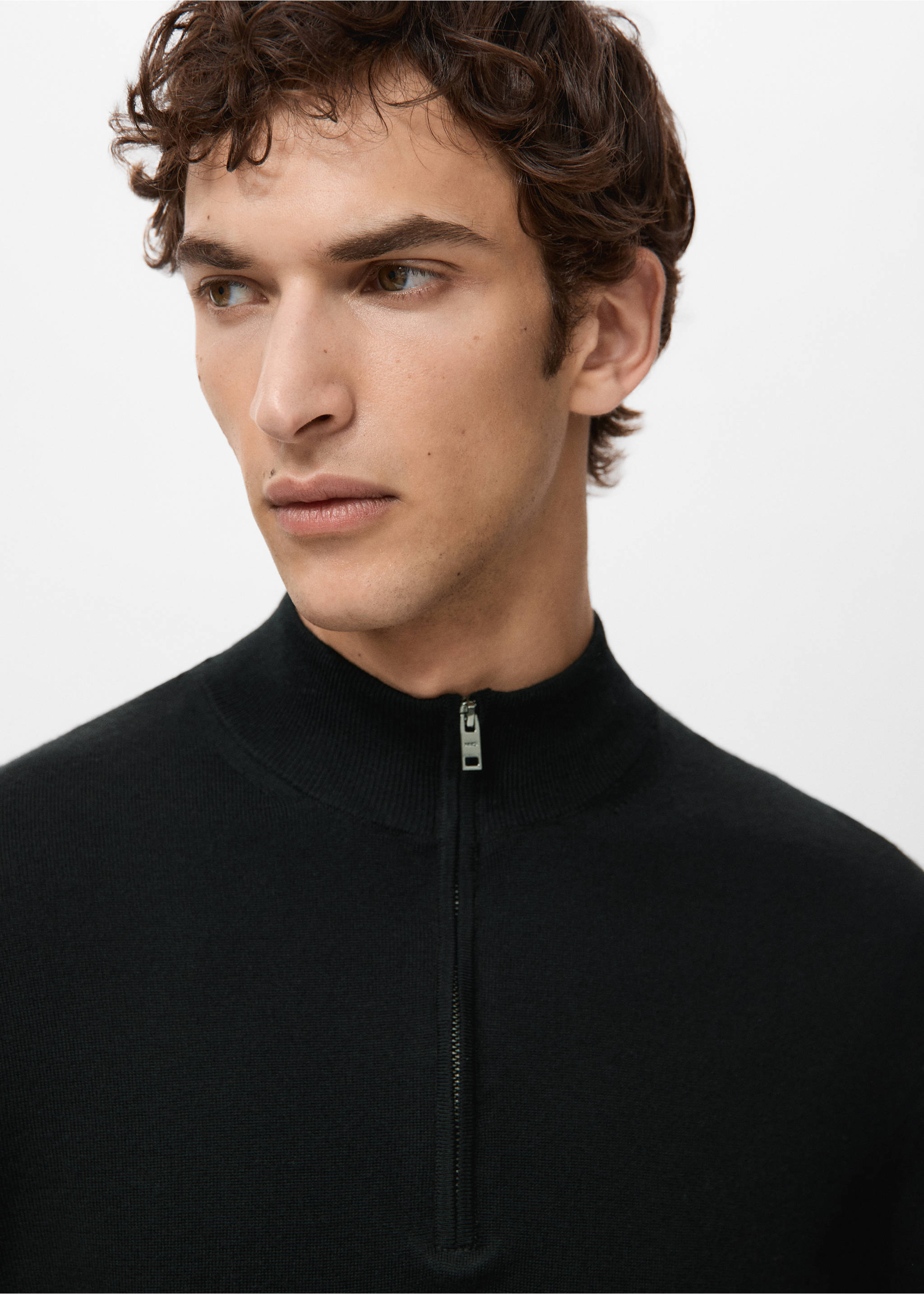 Black knitted jersey with a high zip-up collar, shown in close-up., Black. Ref: 27041285-00.