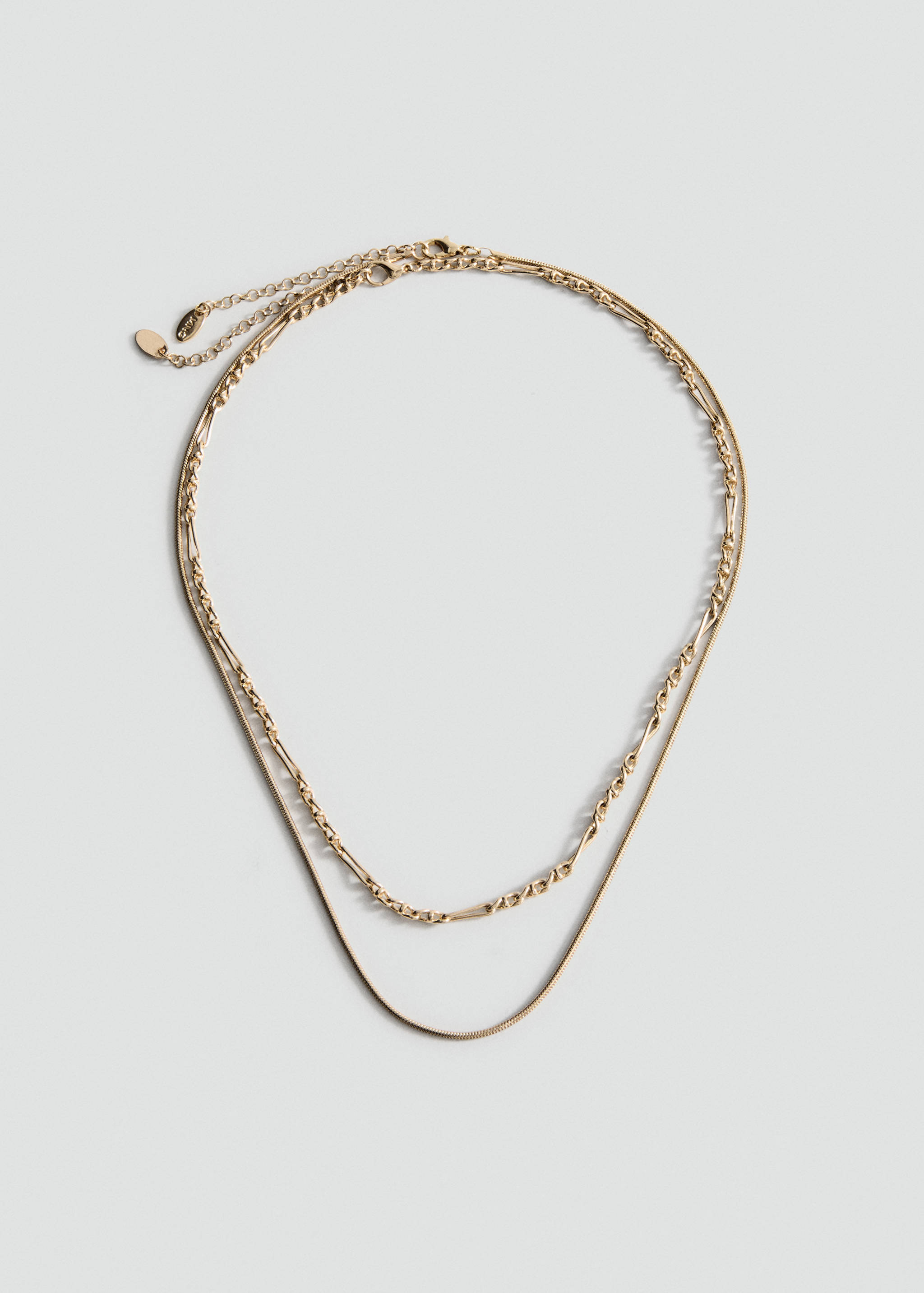 Multi-strand gold-coloured collar necklace with a textured link chain and a flat snake chain.
