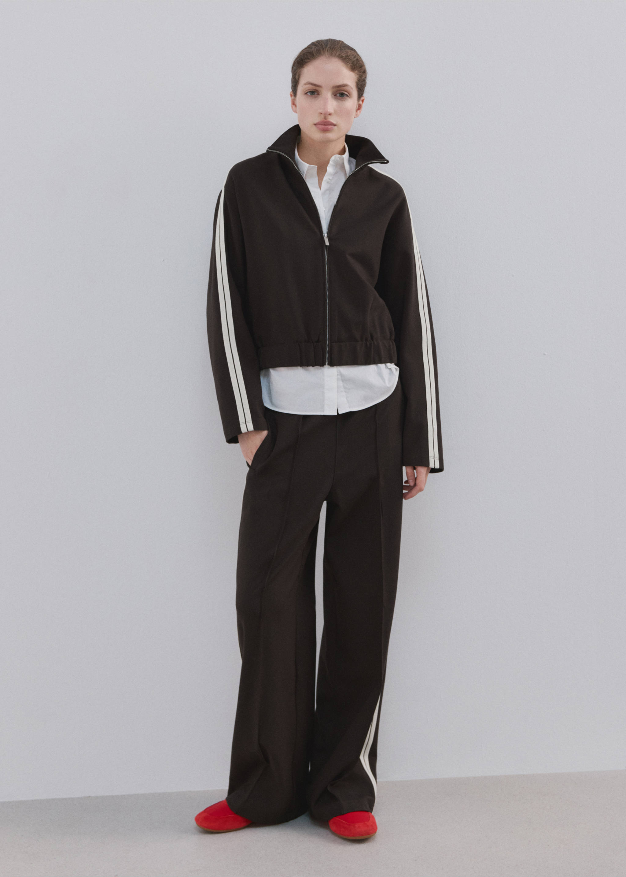 Dark brown zip-up sweatshirt with a high neck and white side stripes., Brown. Ref: 27043306-00.