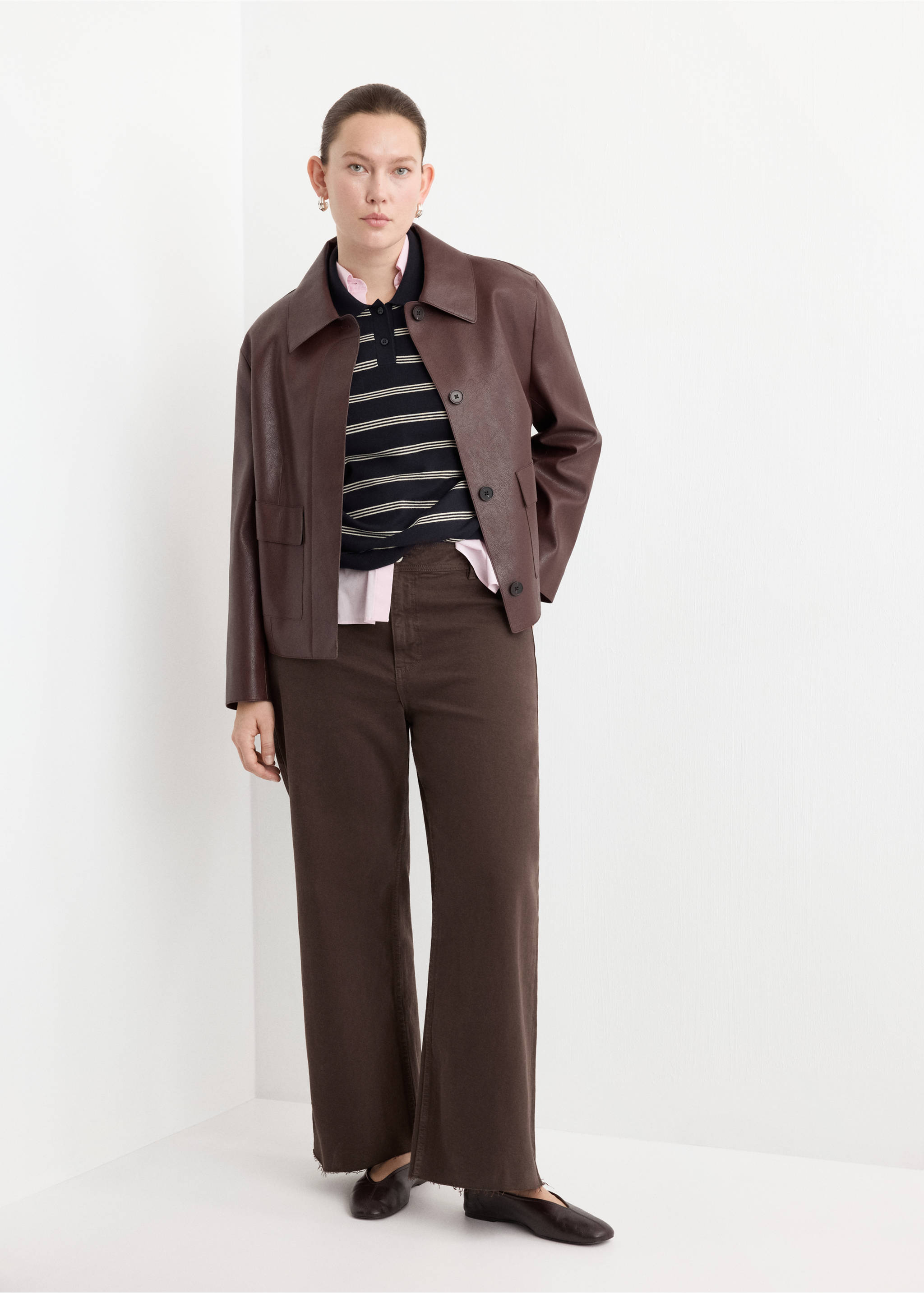 Dark brown straight-leg jeans worn with a brown jacket and striped polo., Chocolate. Ref: 27043342-00.