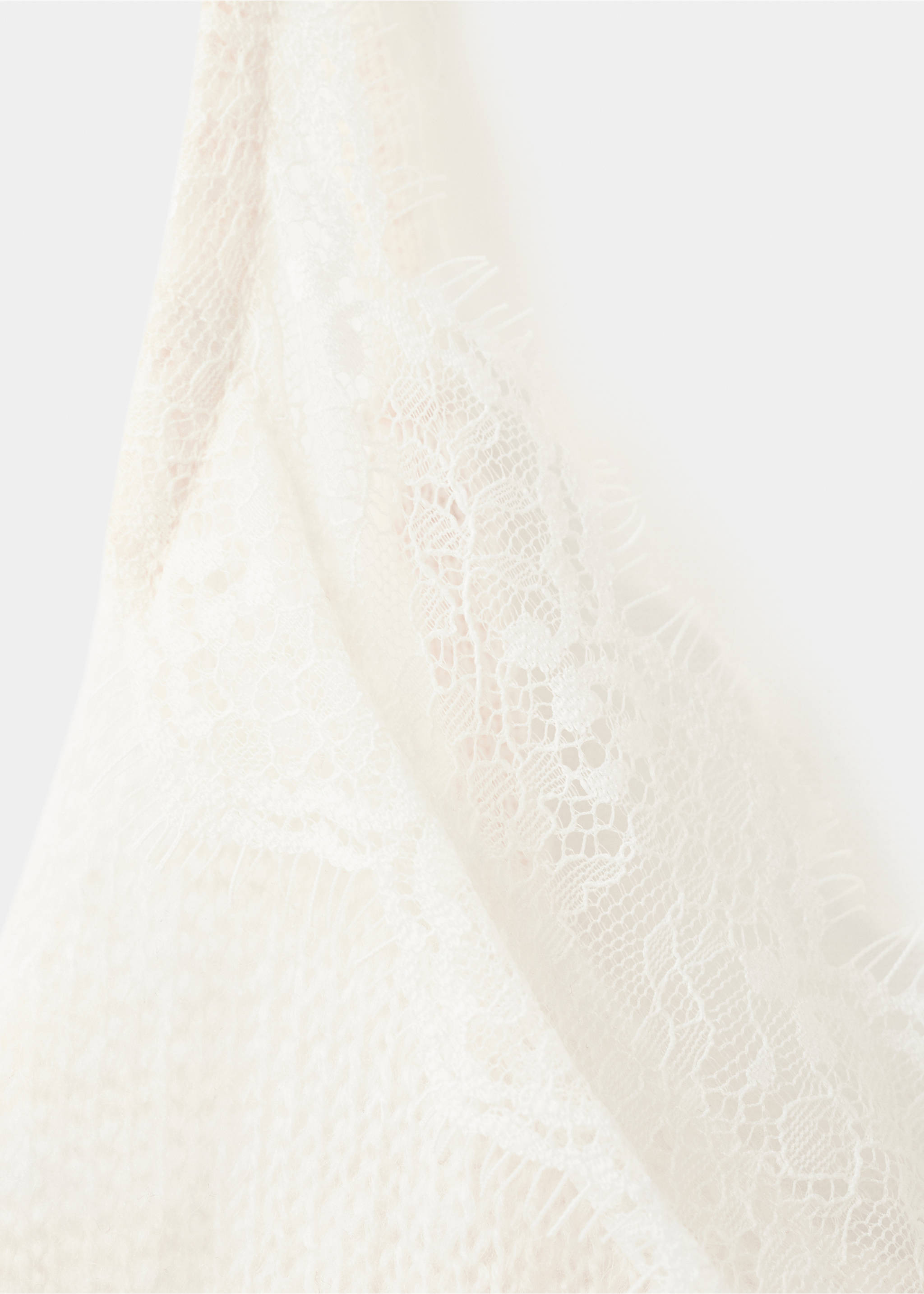 White lace top detail showing intricate floral pattern and trim., Ecru. Ref: 27044097-00.