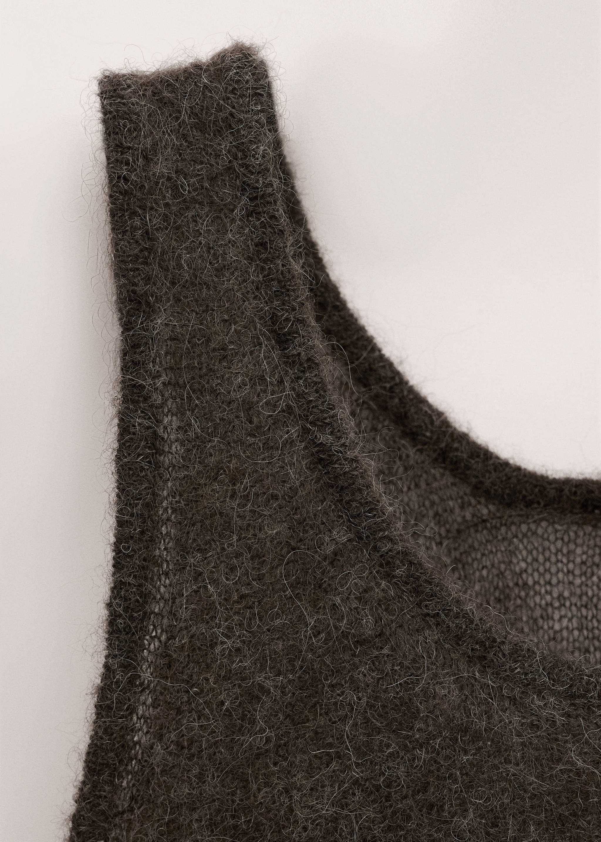 Asymmetric semi-transparent alpaca top - Details of the article 0