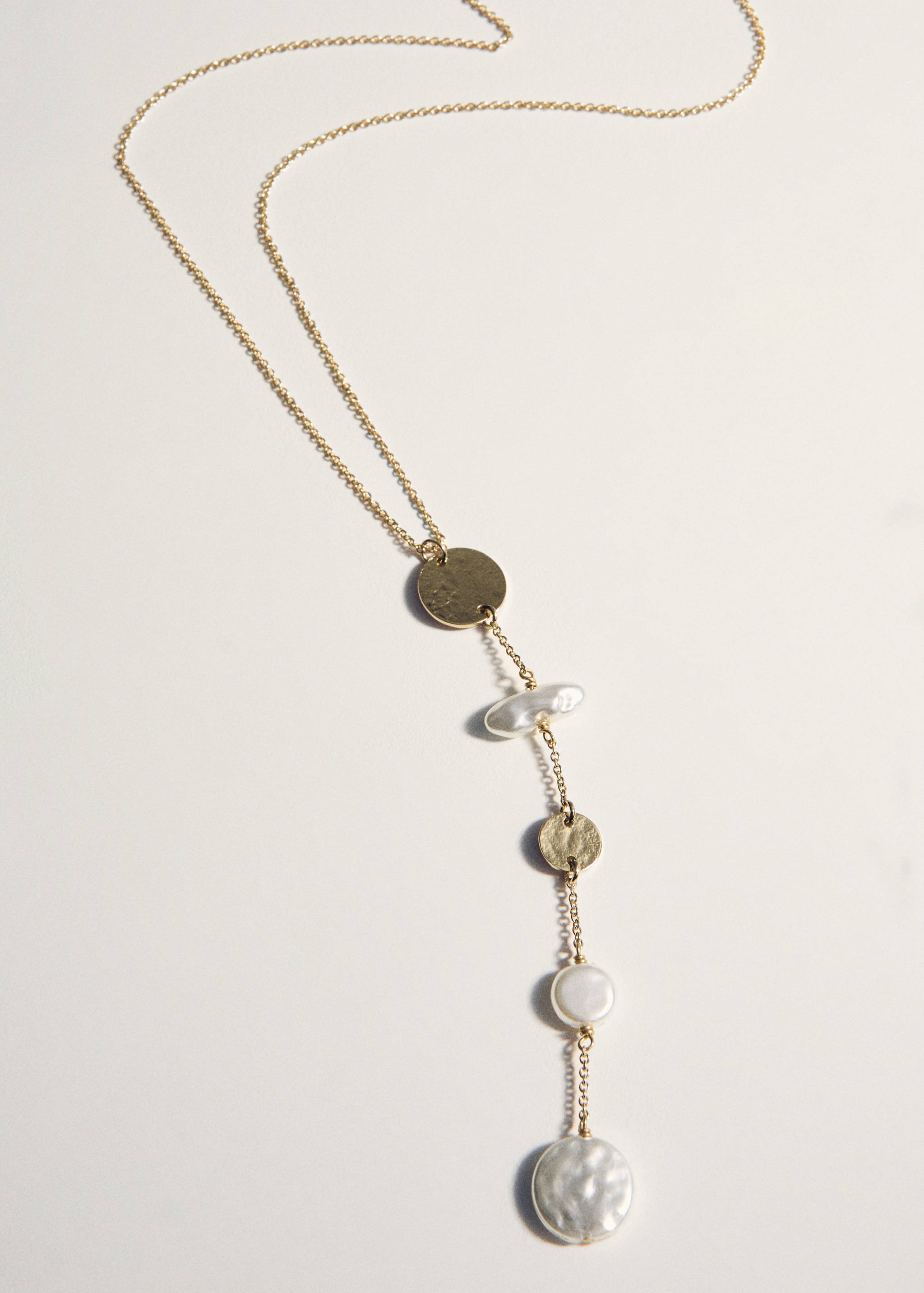 Gold-tone chain necklace with textured metallic discs and pearl-like beads.