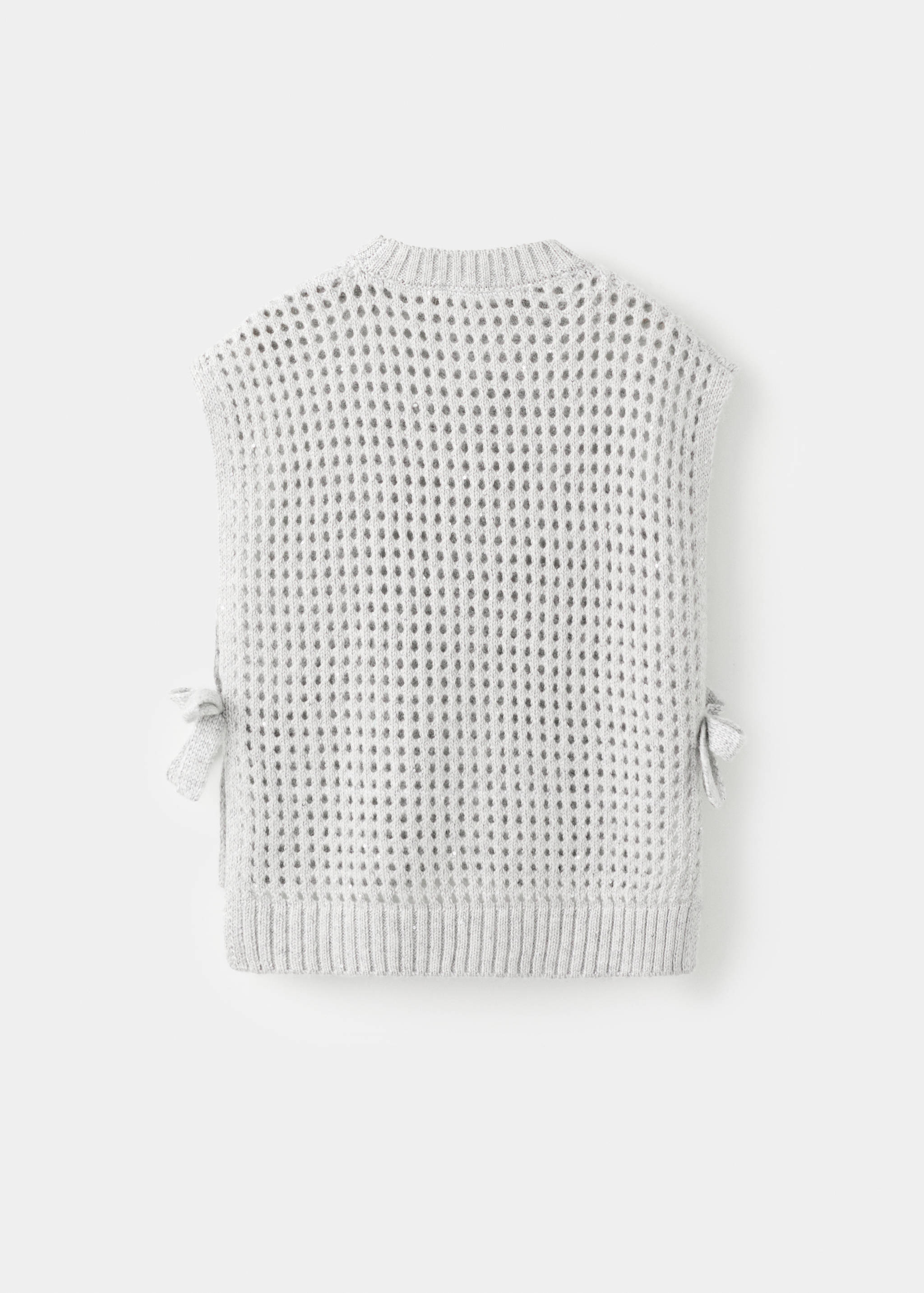 Back view of a grey knitted vest with an openwork pattern and side ties.