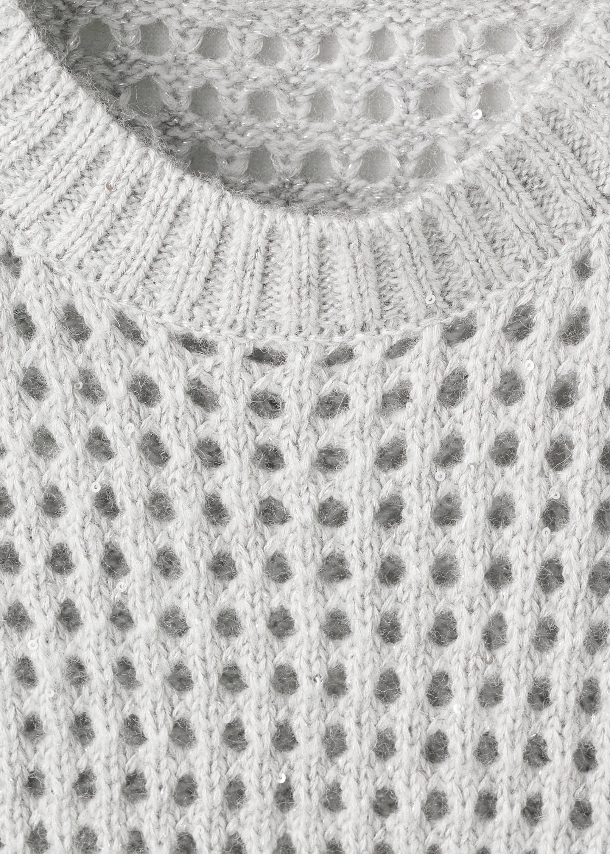 Close-up of a light grey knit vest with a ribbed round neck and open-stitch texture., Light/Pastel Grey. Ref: 27051180-00.