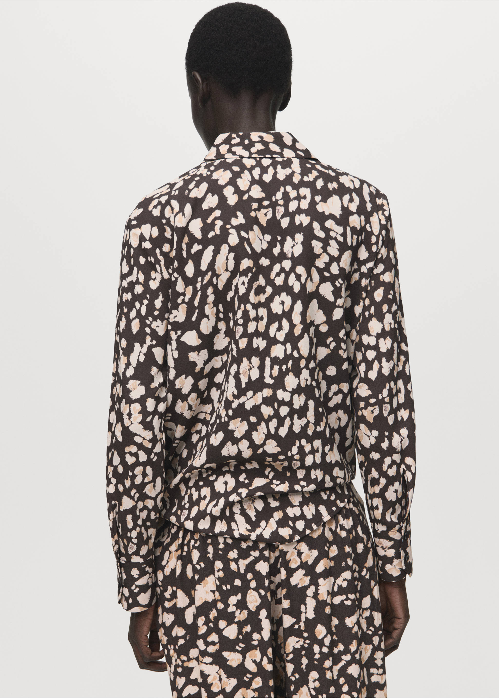 Back view of a brown and beige animal print shirt with long sleeves., Brown. Ref: 27051236-00.