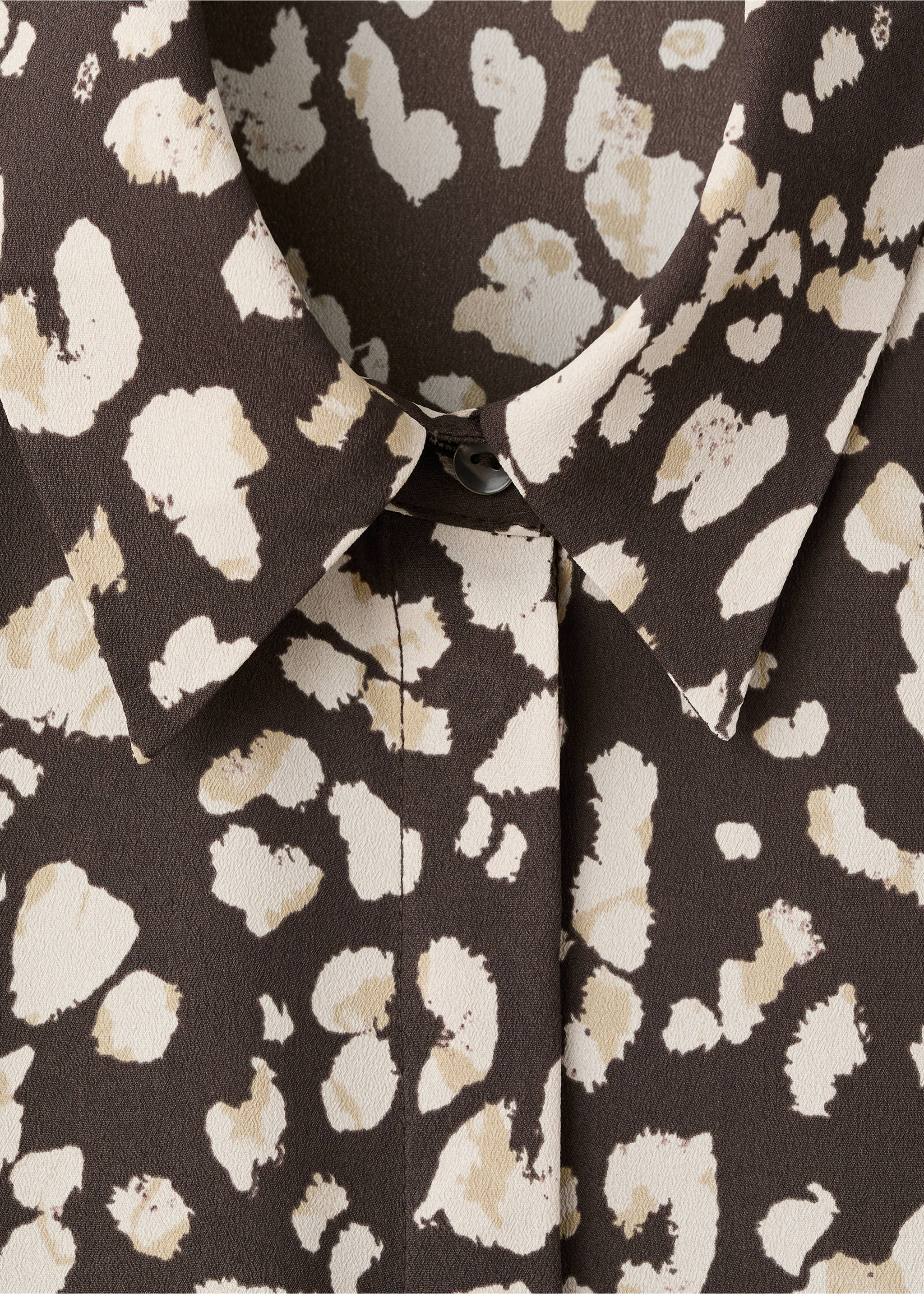 Close-up of a brown animal print shirt with a classic collar., Brown. Ref: 27051236-00.